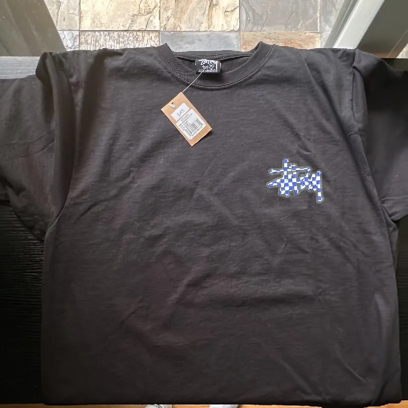 Product image for Stussy Checker Stock Tee, Size M, NWT; sold out online