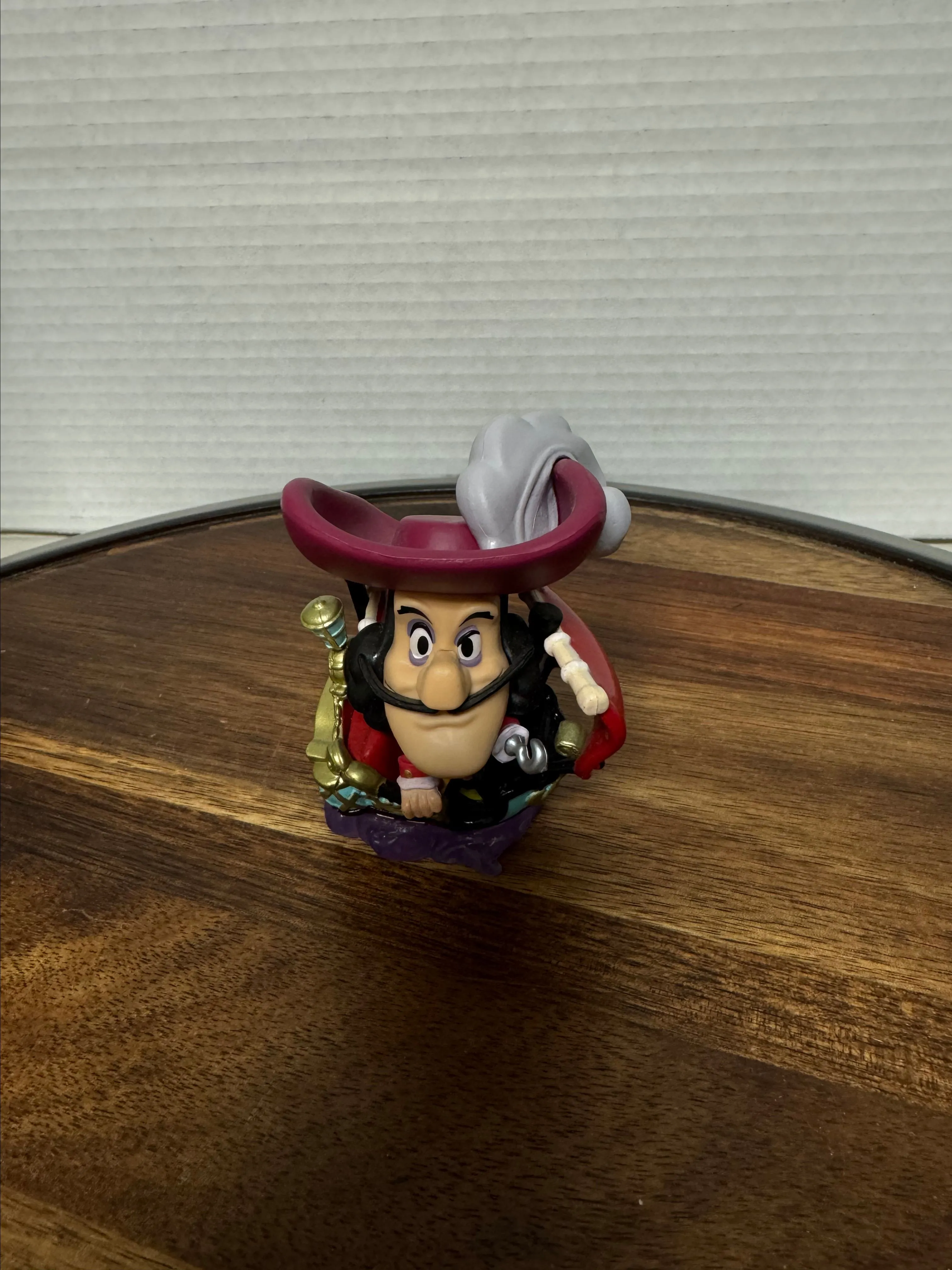 Product image for Funko mini Disneyland 65th anniversary Captain Hook out of box