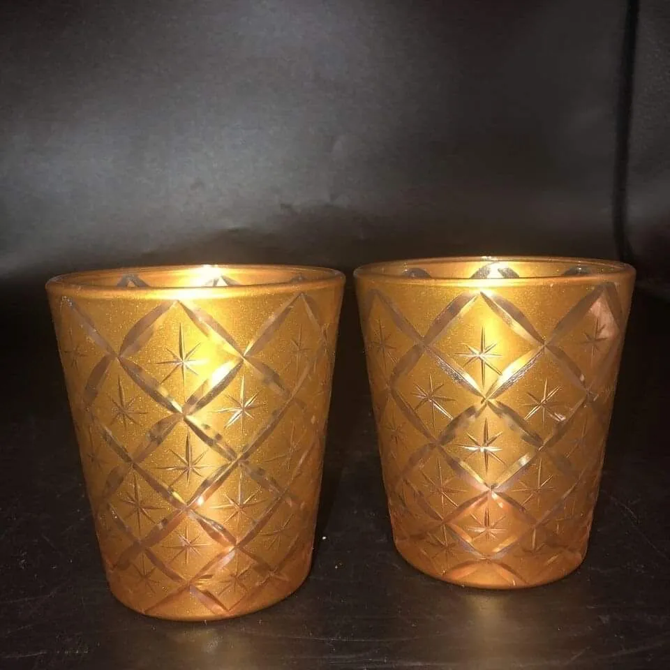 Product image for Set of two Bombay company gold star etched glass tea light candle holders  Or tumblers ￼