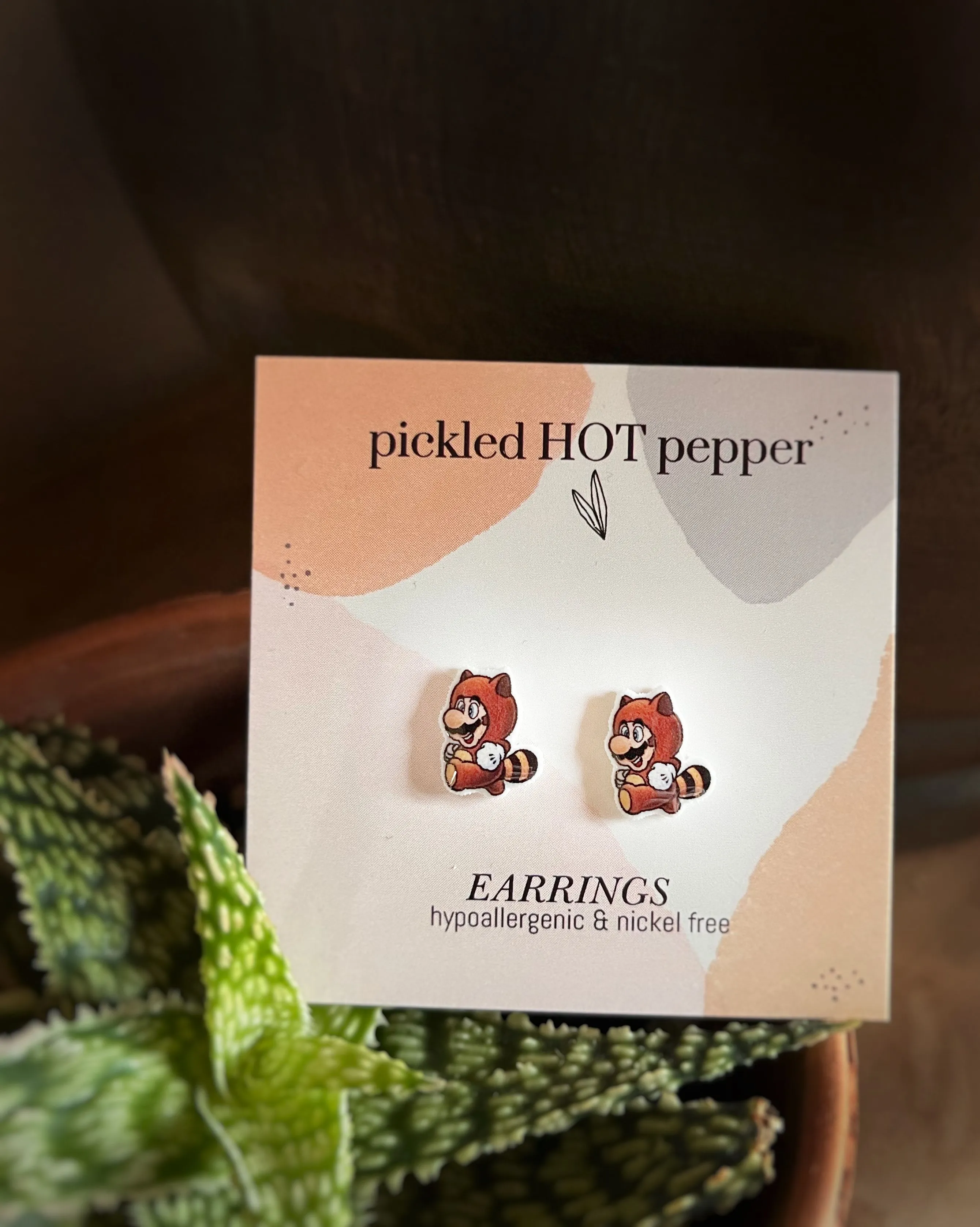 Product image for Super Mario suit raccoon stud earrings