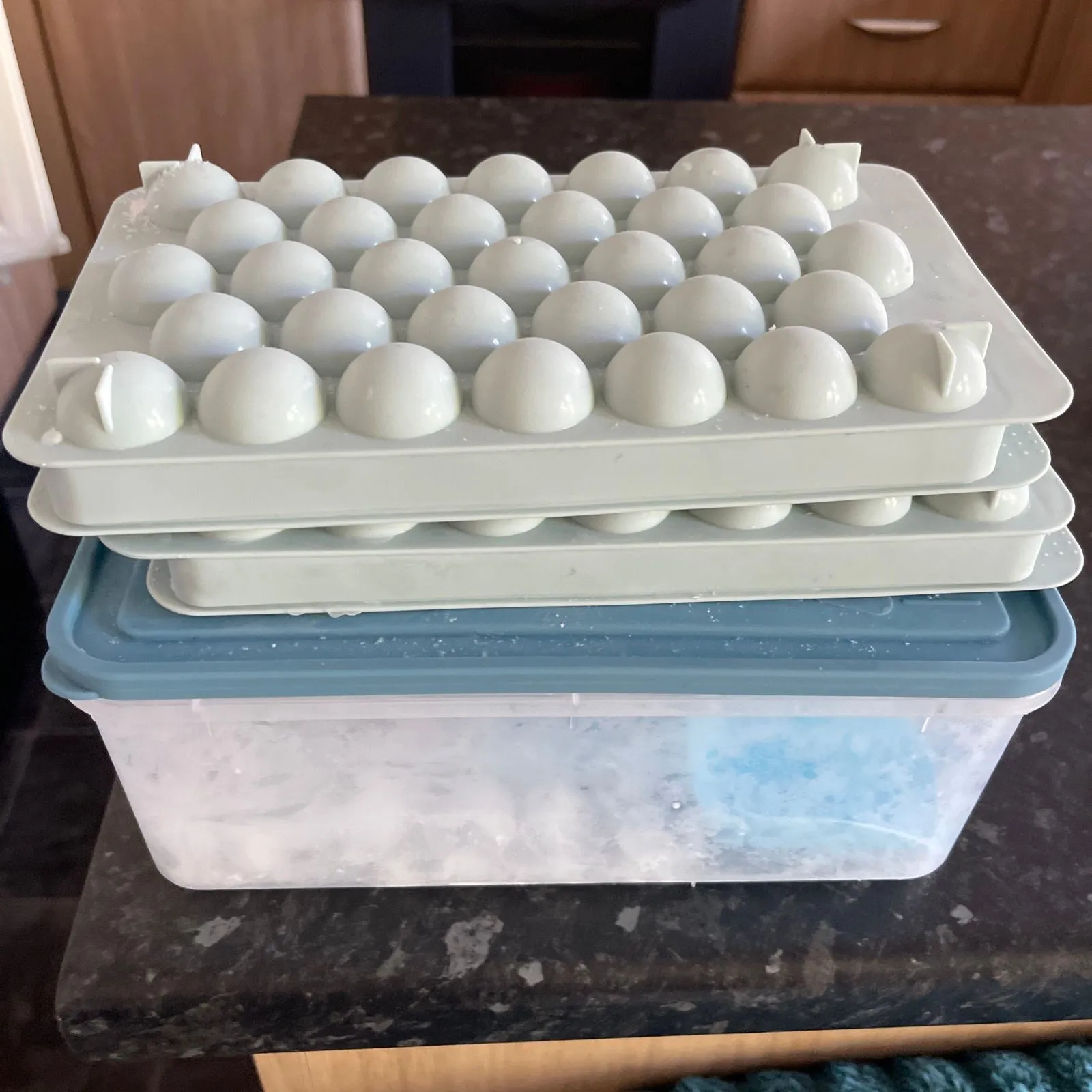 Product image for Round ice cubes with container lid and shovel. Makes 160 round ice cubes at a time