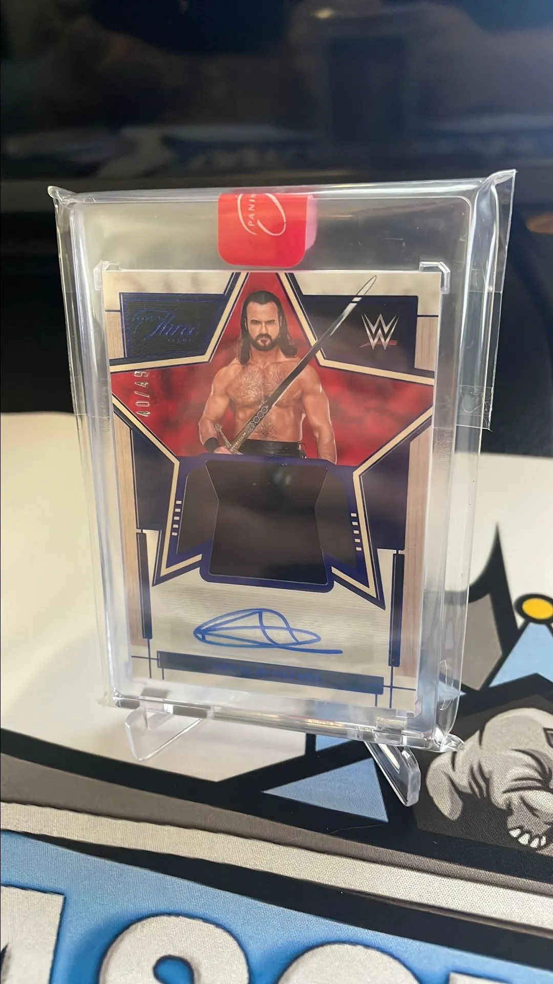 Product image for 2024 Three Count WWE - Drew McIntyre Swatch Auto /49 Encased