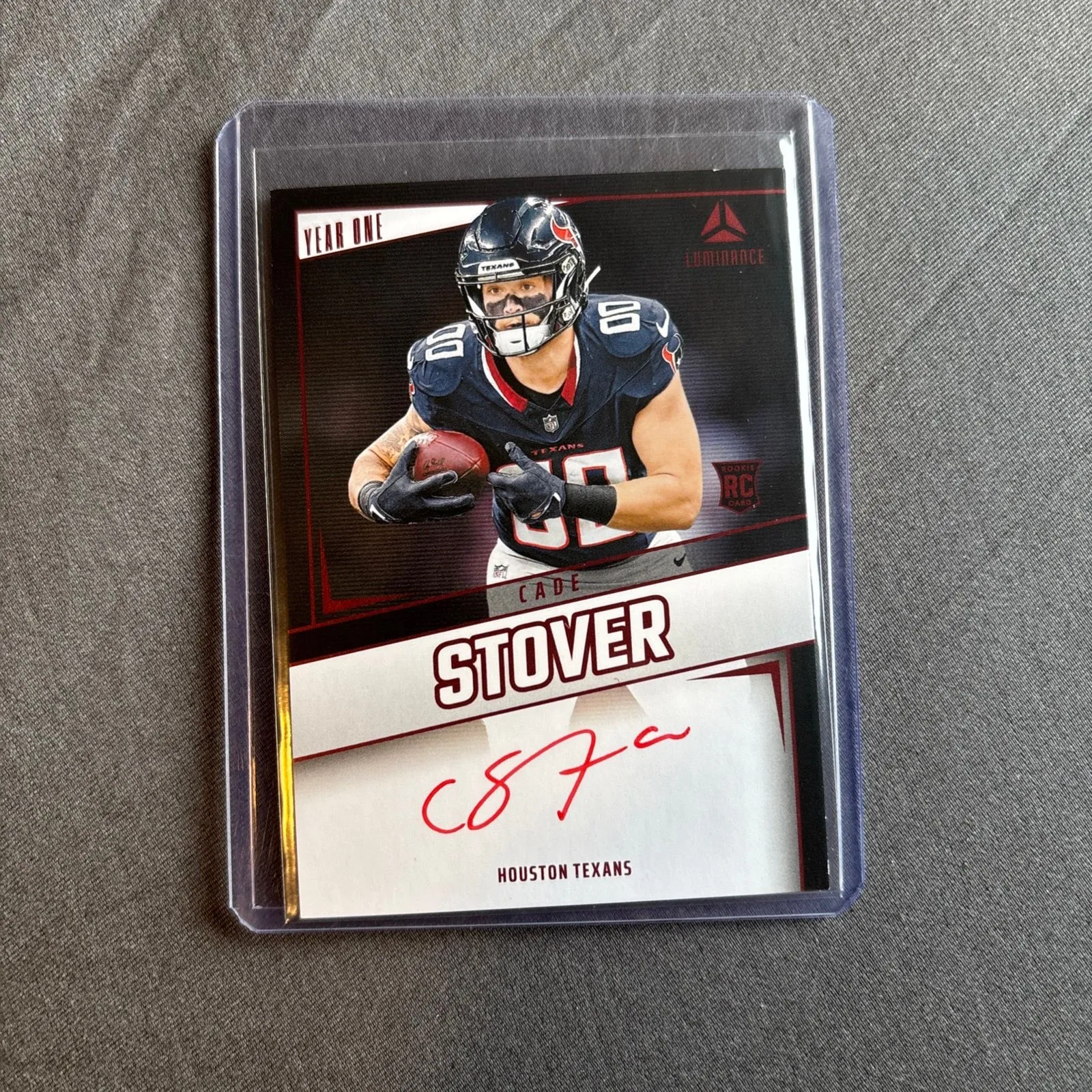 Product image for 2024 Panini Luminance Cade Stover RC Year One Auto Red Ink Houston Texans Color Match
