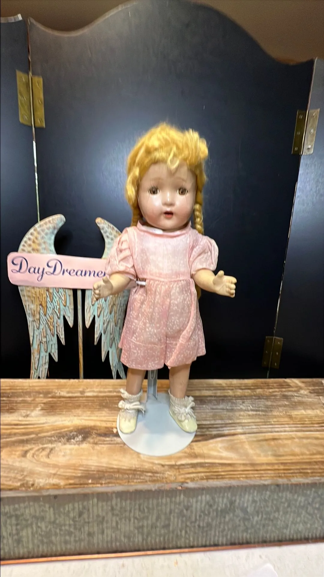 Product image for Doll 13. Composition door with blonde hair and pigtails.