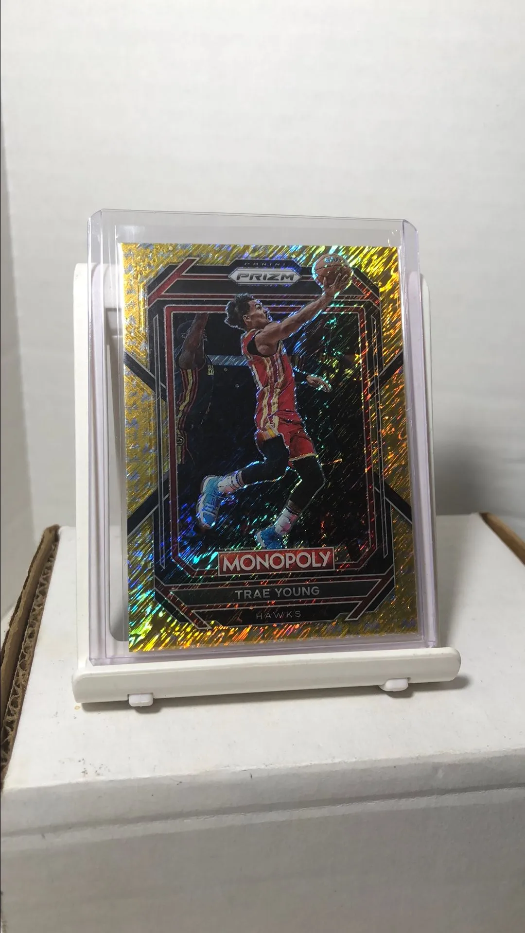 Product image for Trae Young 2022-23 Prizm Monopoly Gold Shimmer /500