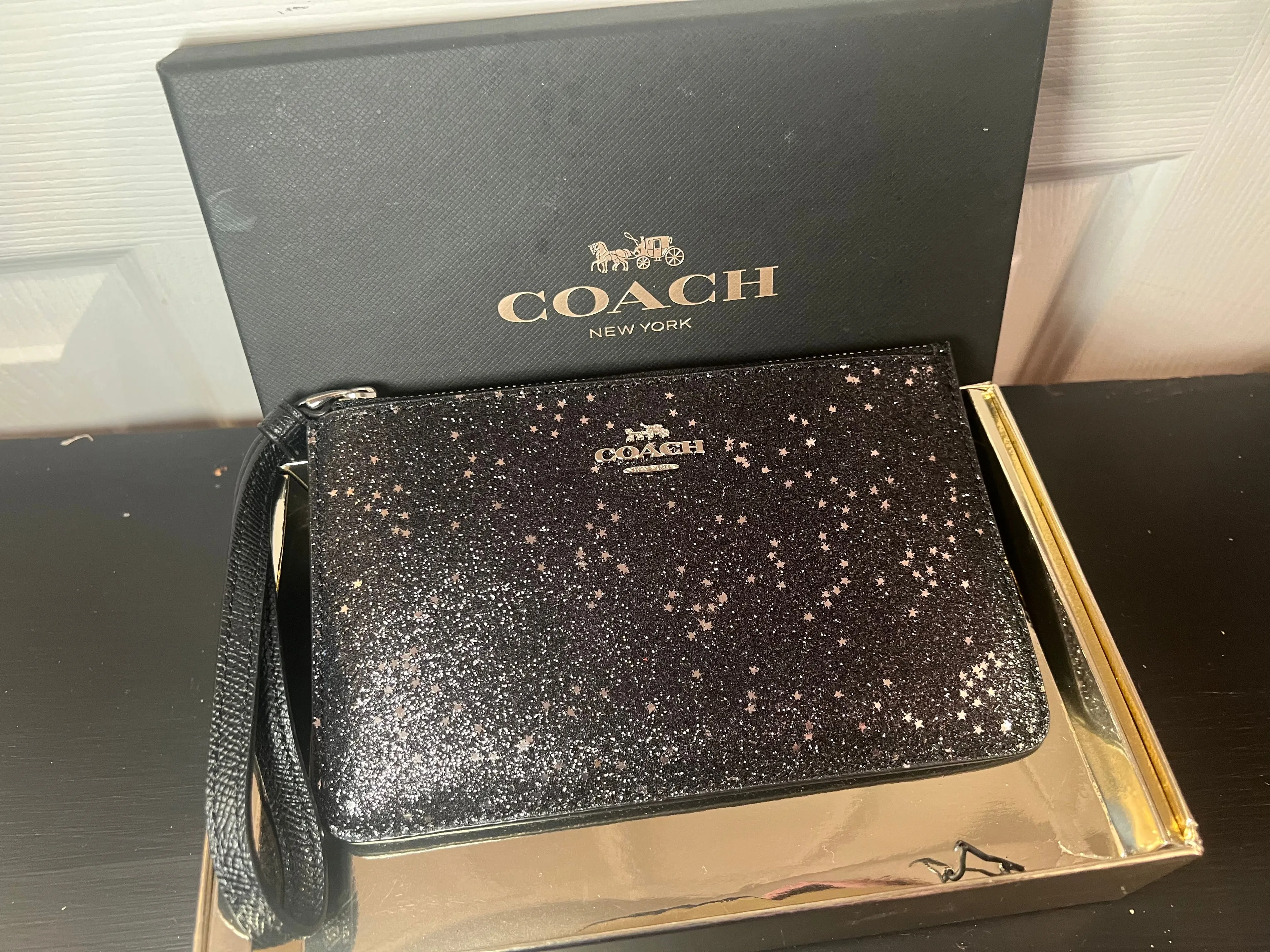 Product image for Black and gold sparkling wristlet