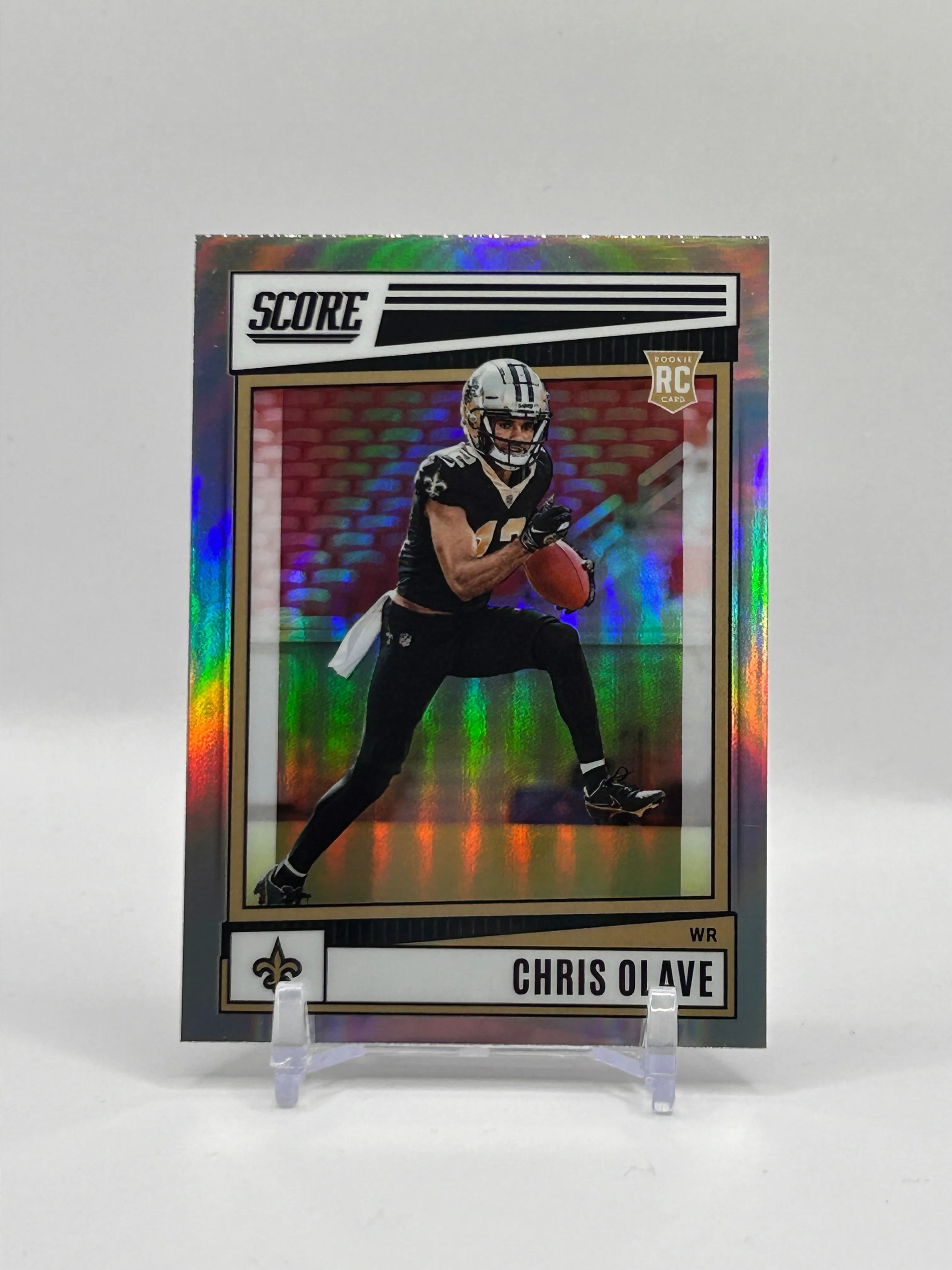 Product image for 2022 Chronicles Score Football • Chris Olave Silver Prizm Rookie