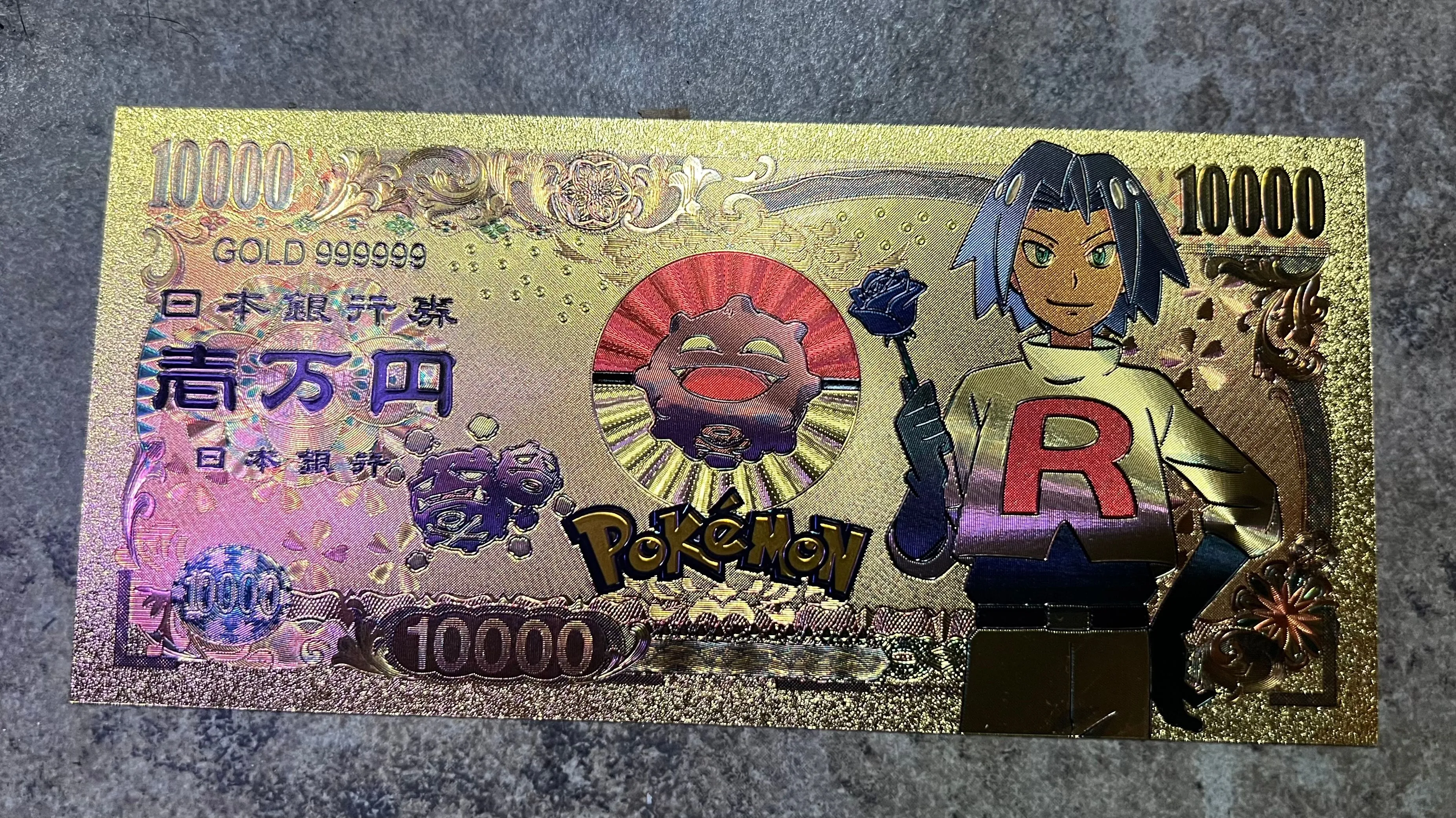 Product image for Team Rocket James Gold 10000 Yen Banknote