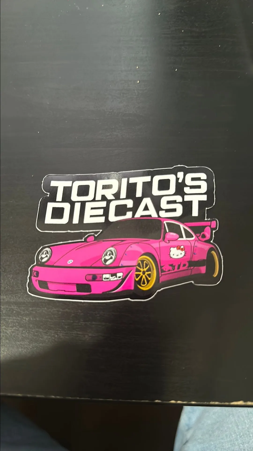 Product image for Porsche toritos diecast sticker. Pink hello kitty
