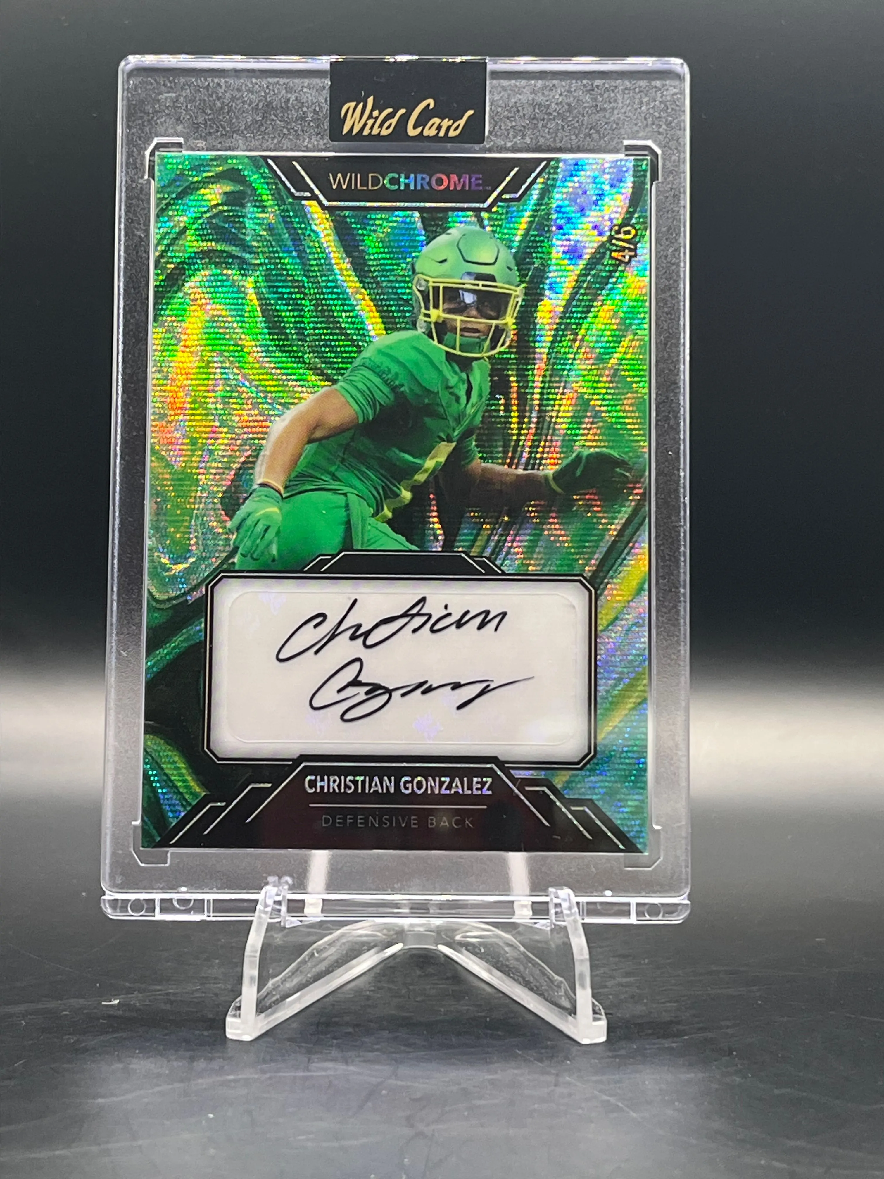 Product image for 4/6 Christian Gonzalez Oregon / Patriots DB 2023 Wild Card WildChrome WildLiquid Auto Green Wave