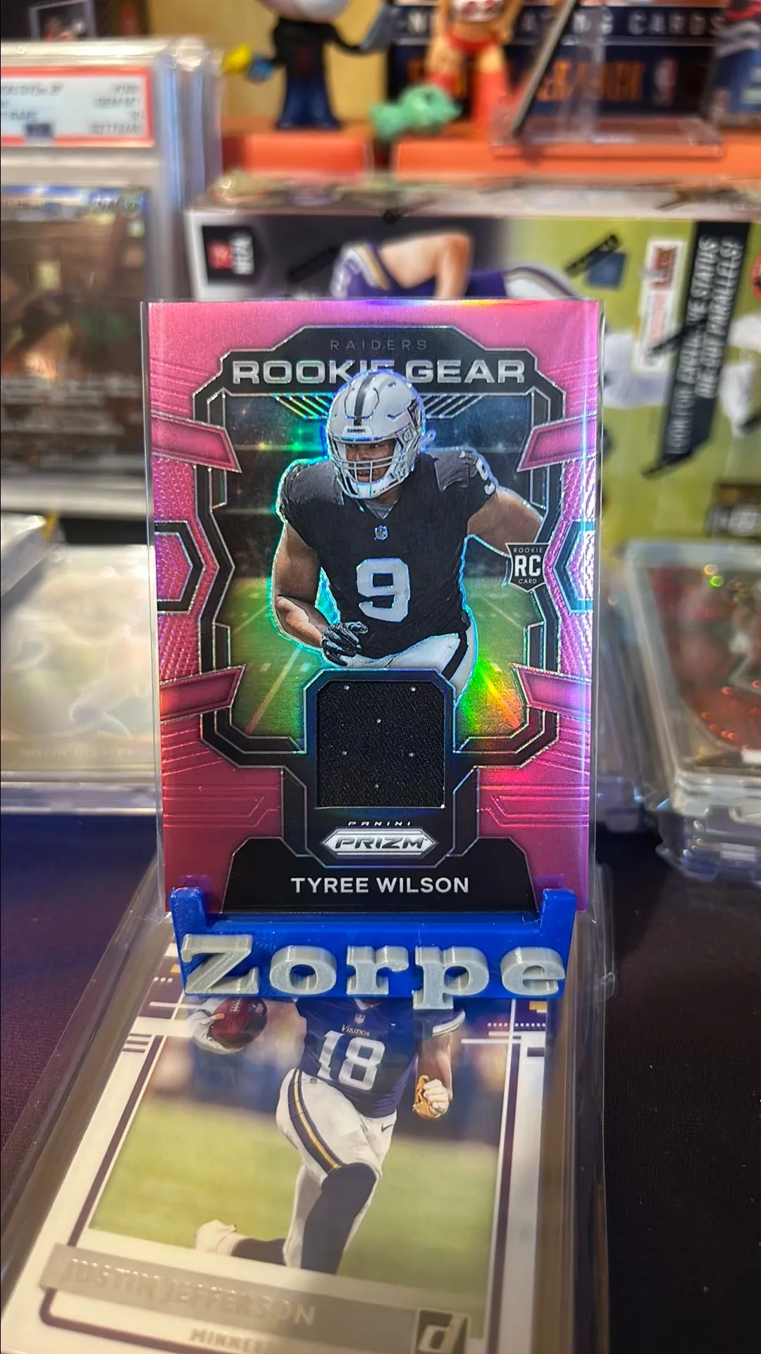 Product image for TYREE WILSON 2023 PANINI ROOKIE GEAR PINK PRIZM VEGAS RAIDERS JERSEY PATCH RELIC