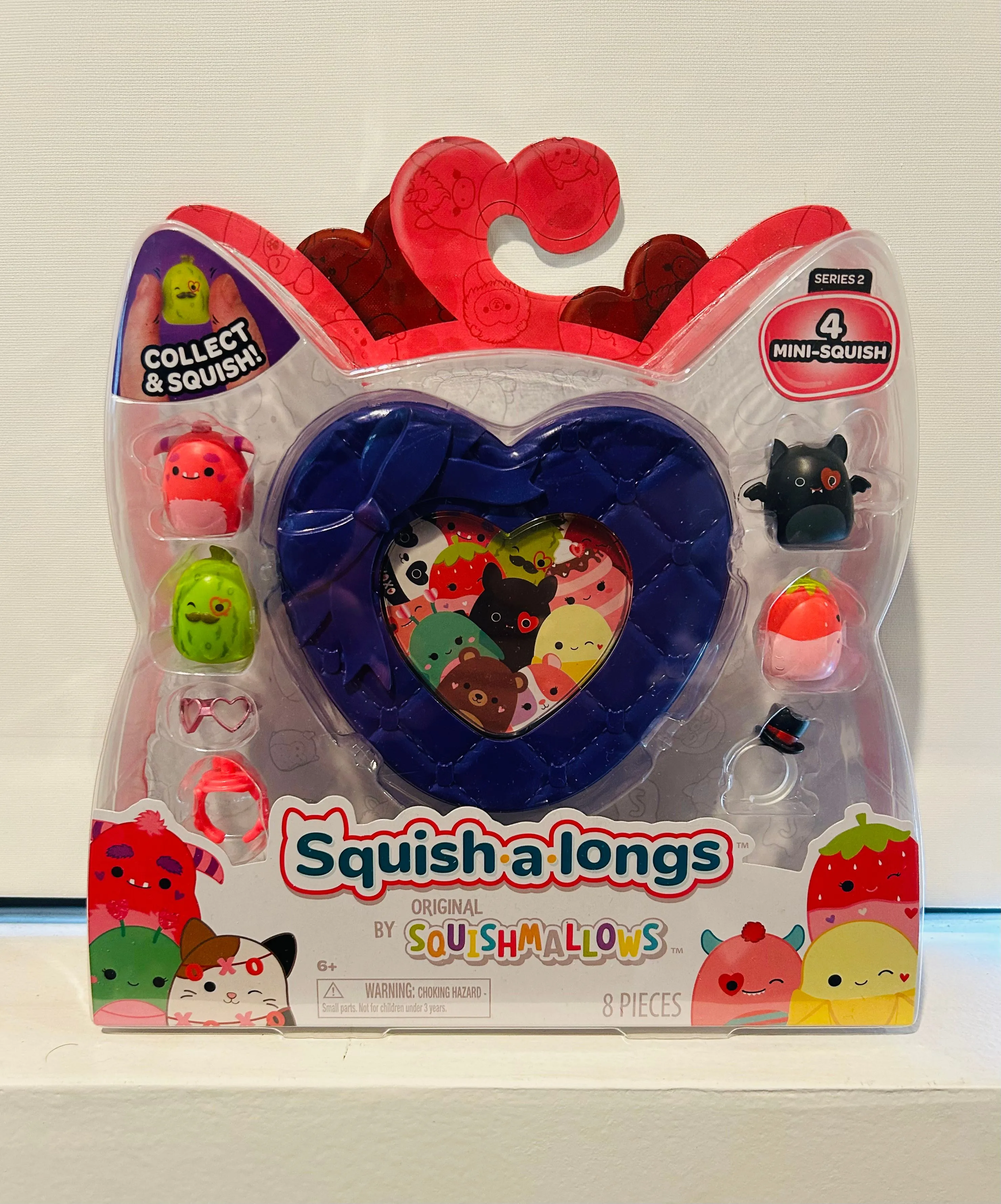 Product image for SQUISHMALLOWS SQUISH-A-LONGS VALENTINE'S DAY-8 PC SET-SERIES 2 PURPLE HEART CASE