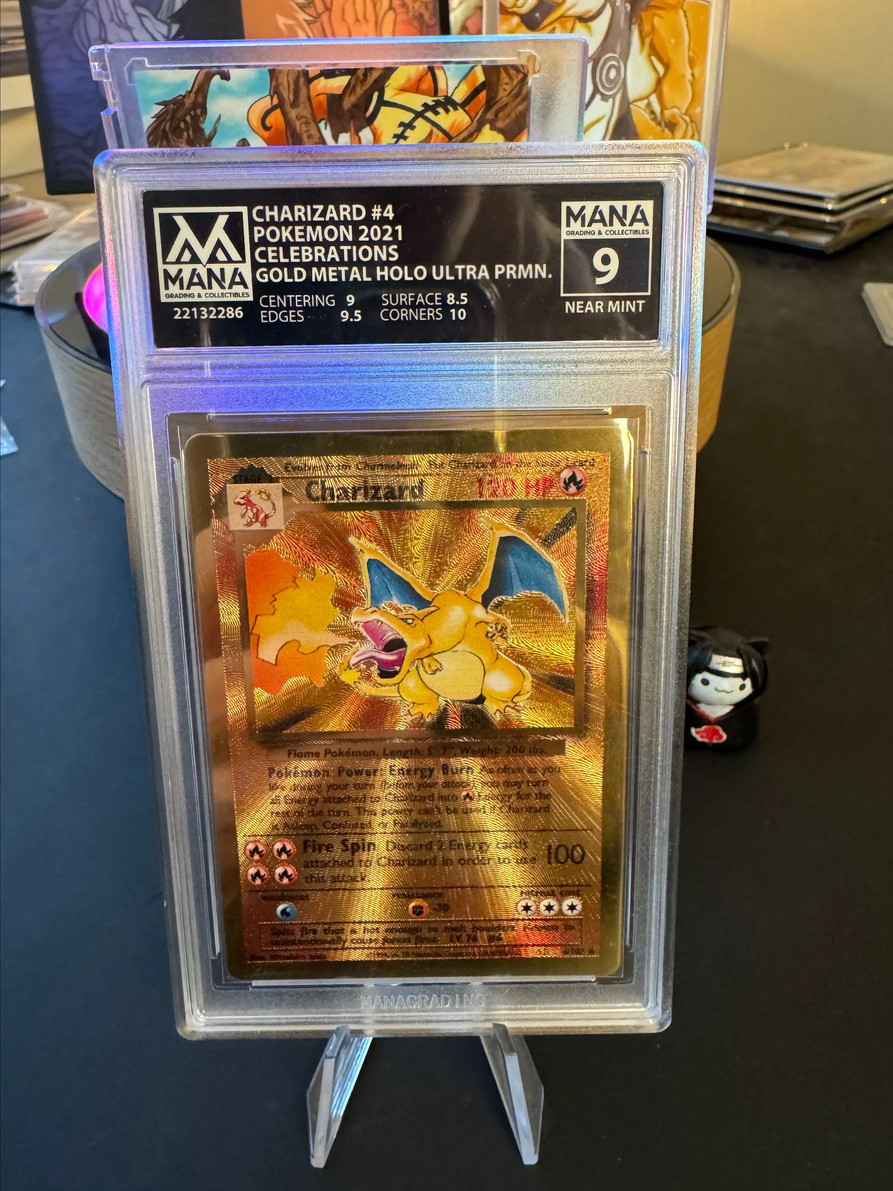 Product image for Gold Metal Celebrations Charizard Mana 9