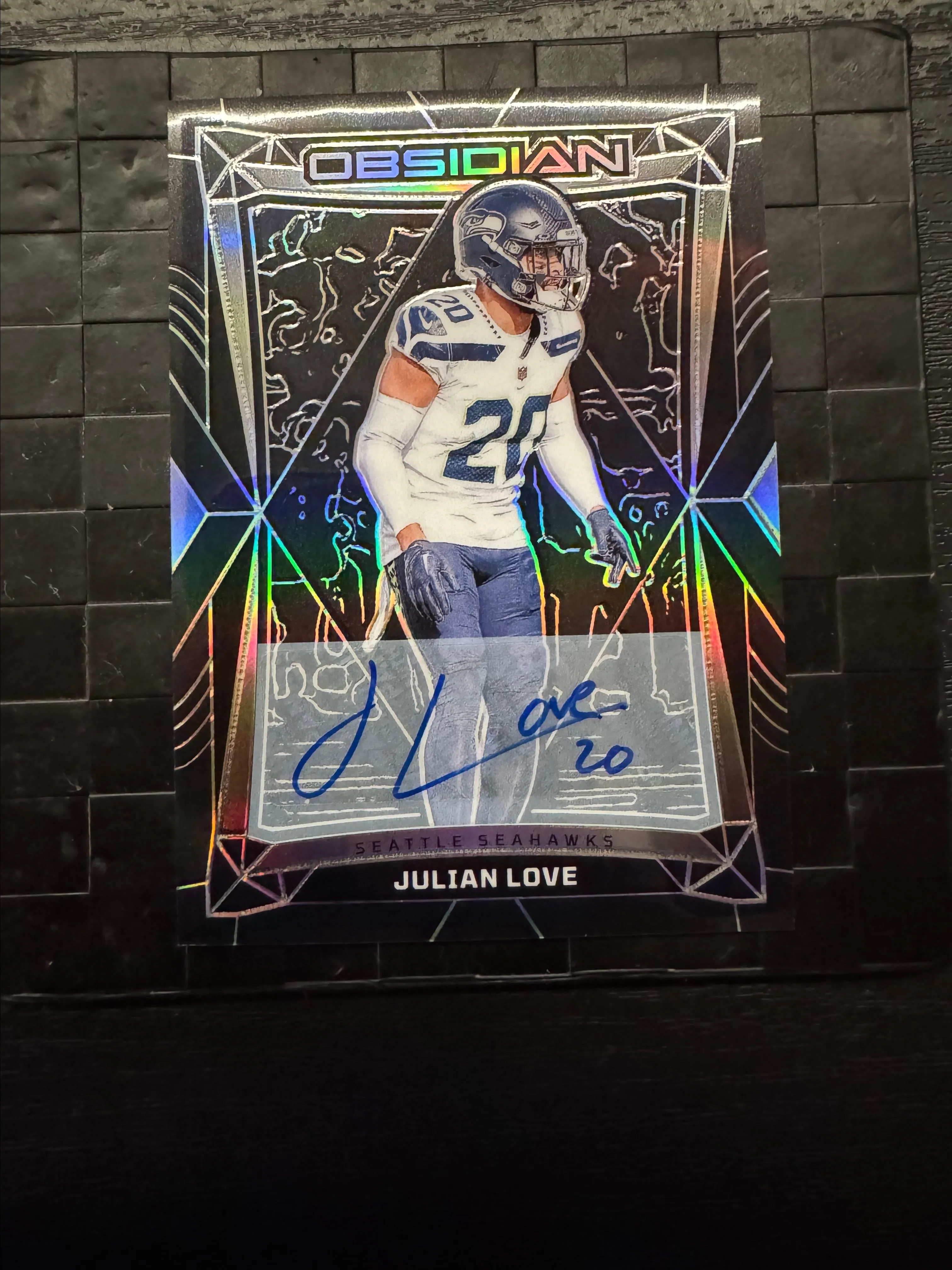 Product image for 2024 Panini Obsidian Julian Love Auto no.180 Seattle Seahawks