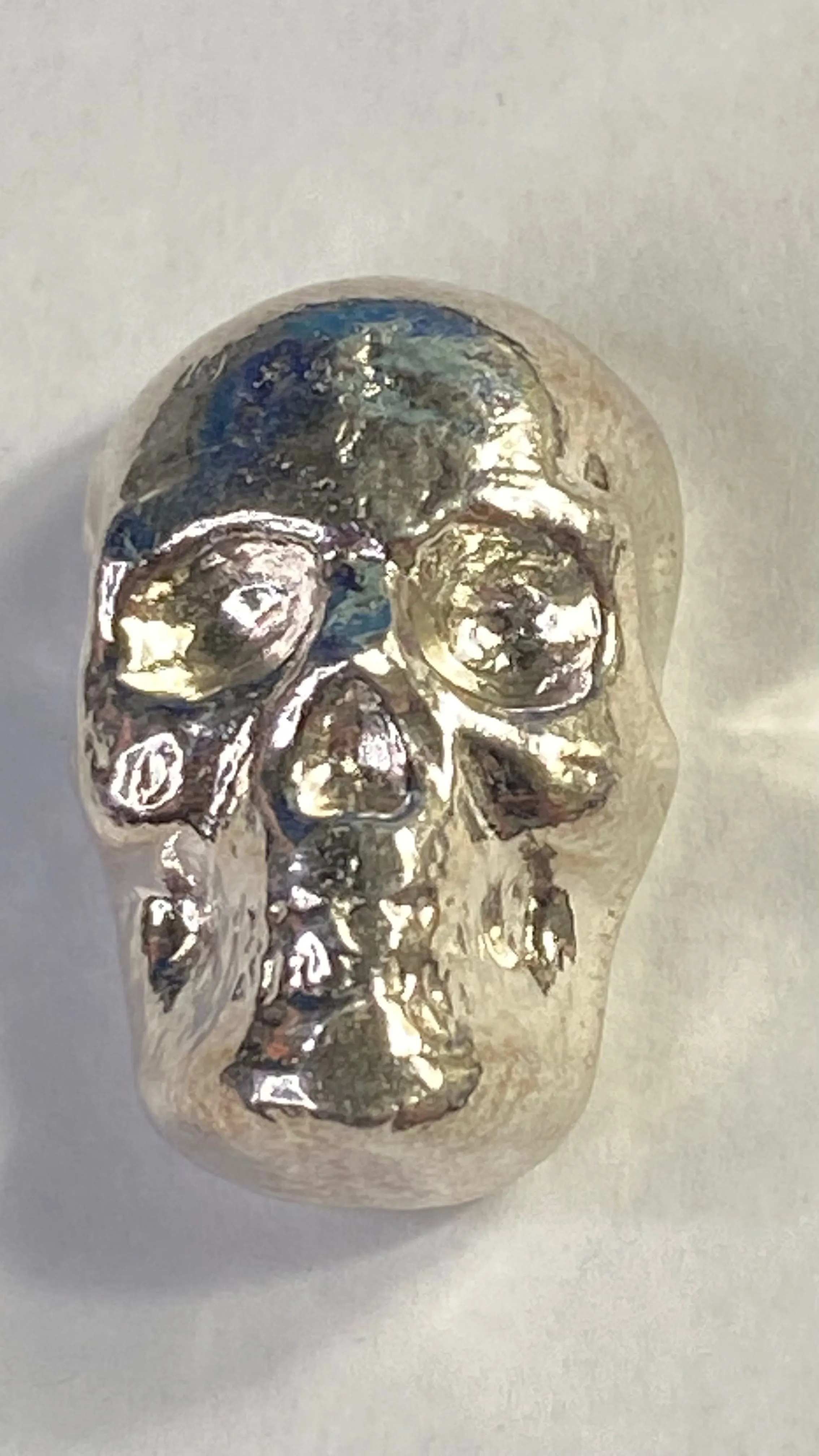 Product image for 1 Hand Poured Troy Ounce 0.999 Silver Skull YPS Yeager's Poured Silver