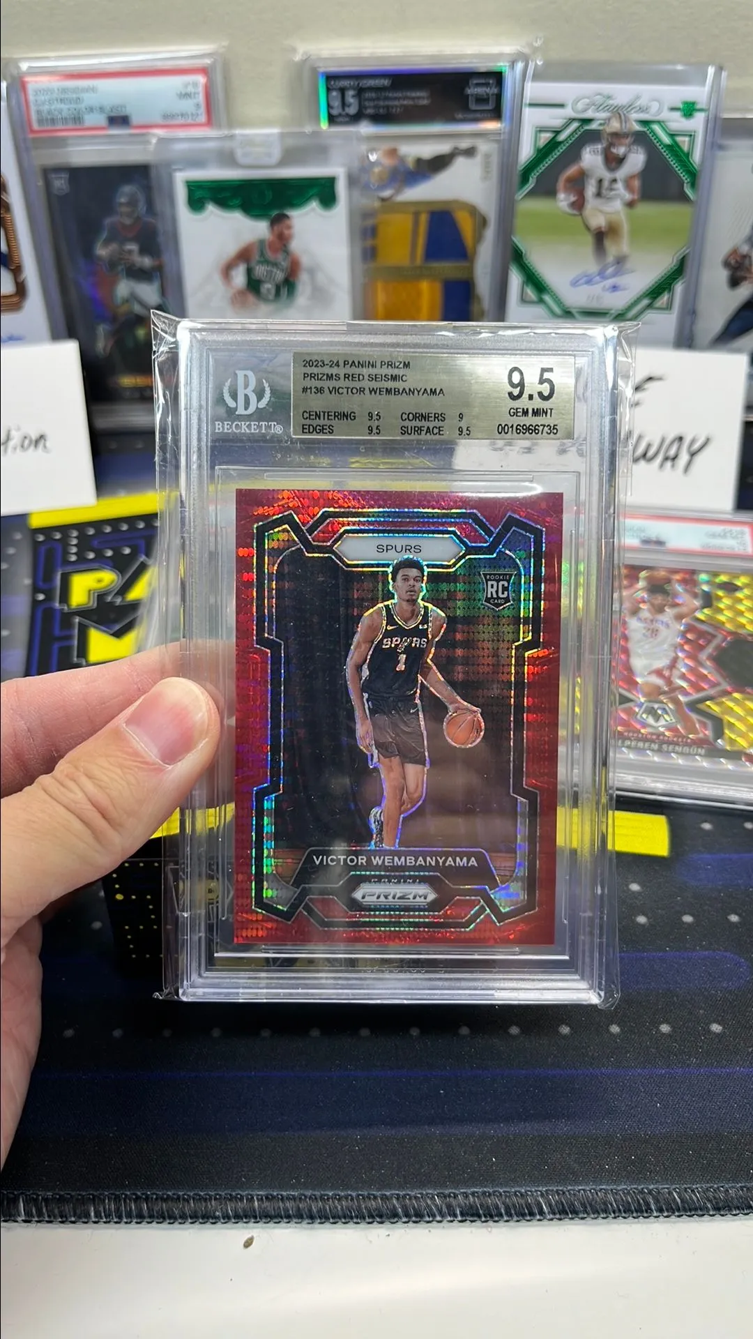 Product image for Victor Wembanyama red seismic prizm rookie /299 bgs 9.5