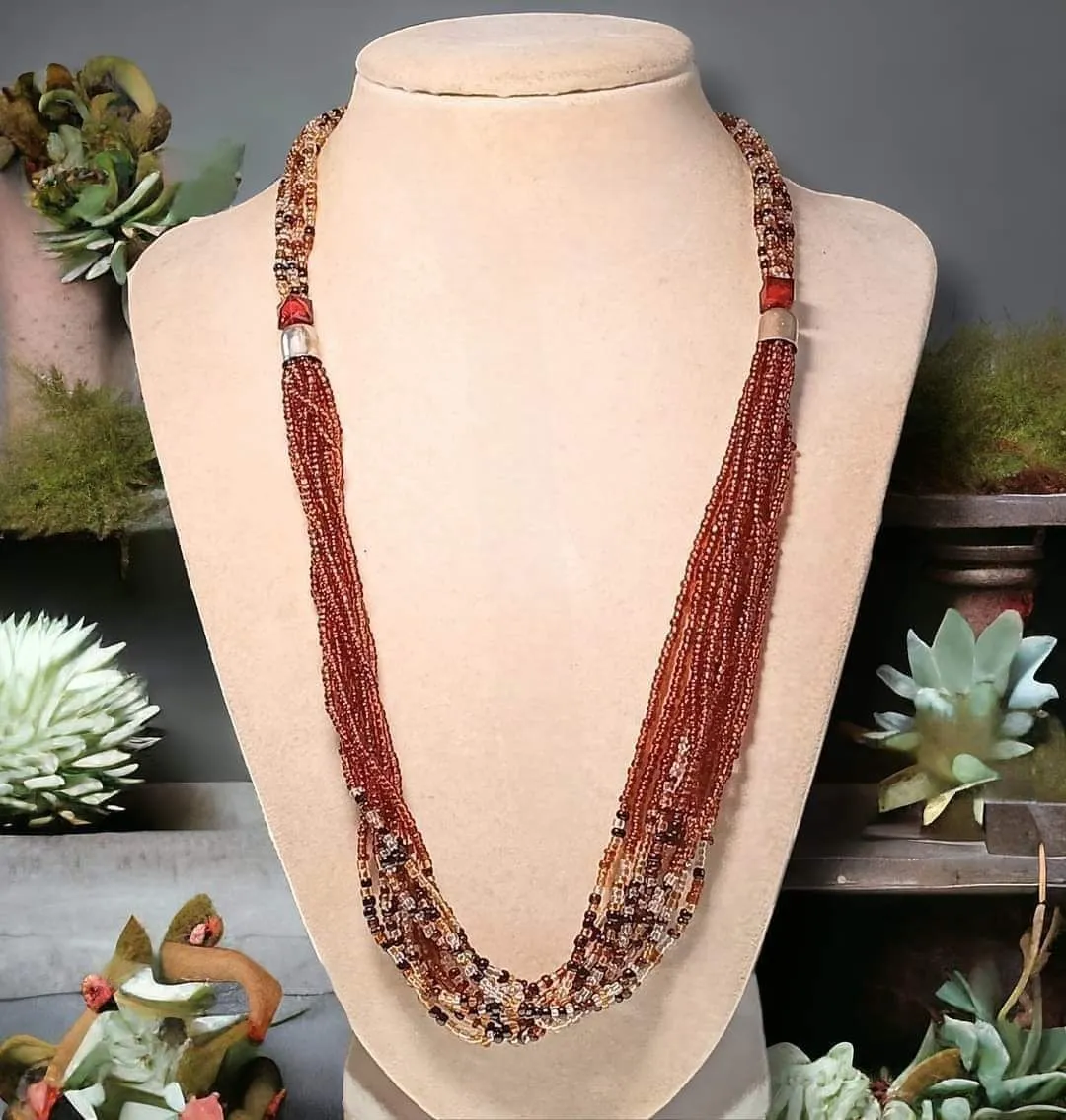 Product image for Vintage multi-strand glass beaded 21" necklace.