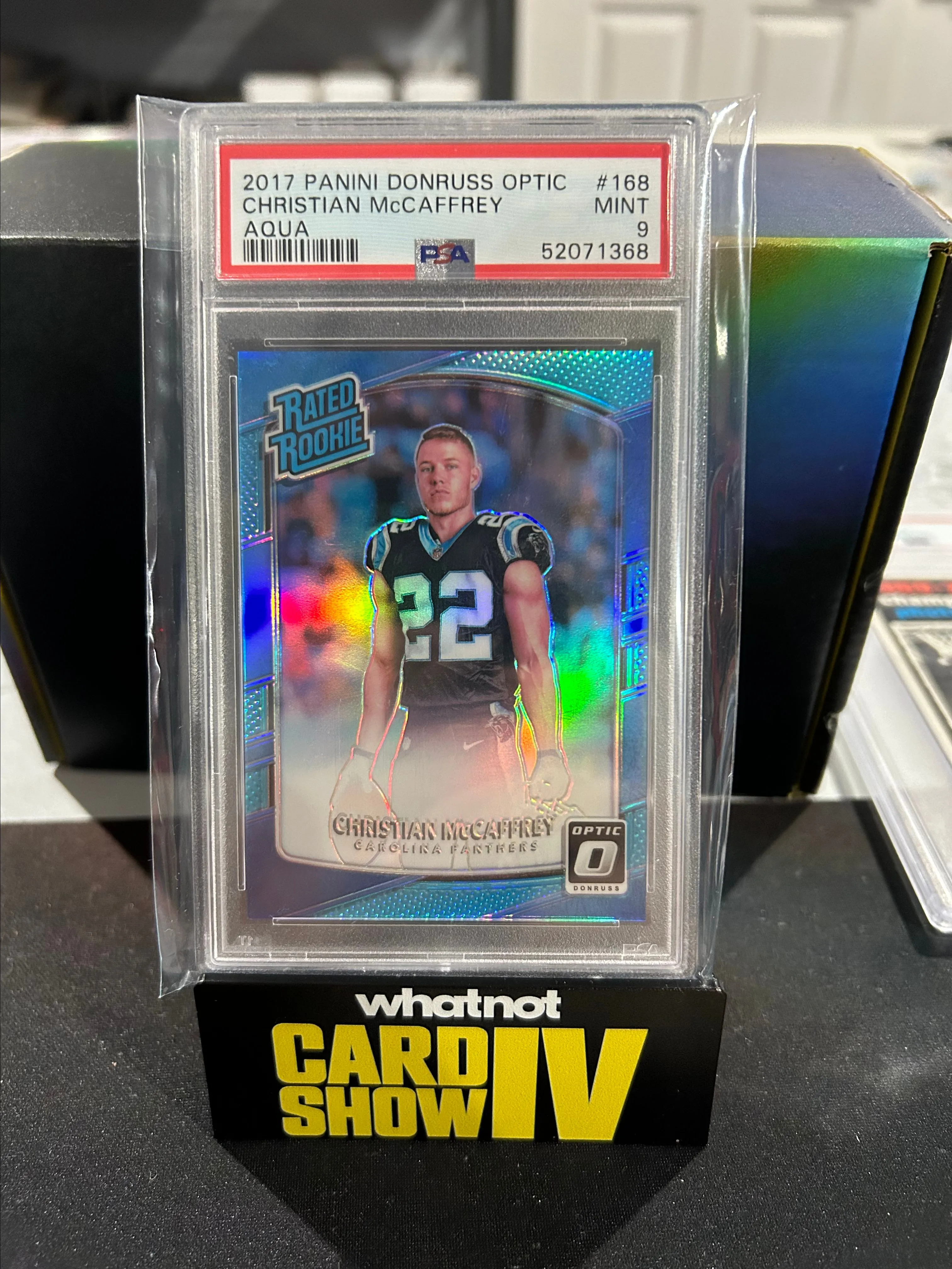 Product image for Christian McCaffrey Optic Aqua Rated Rookie /299 PSA 9