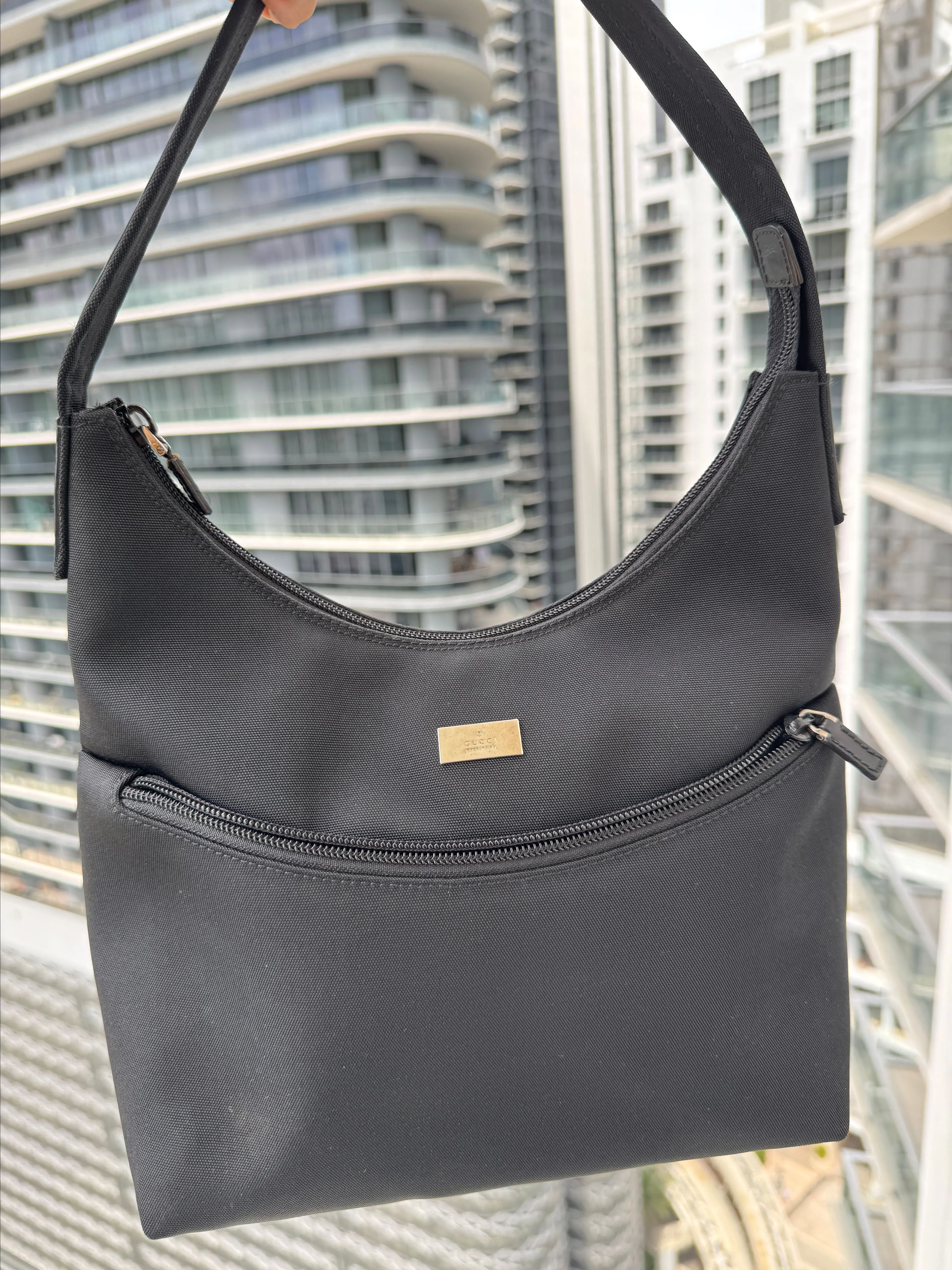 Product image for 18. Gucci Nylon Hobo Bag in Black