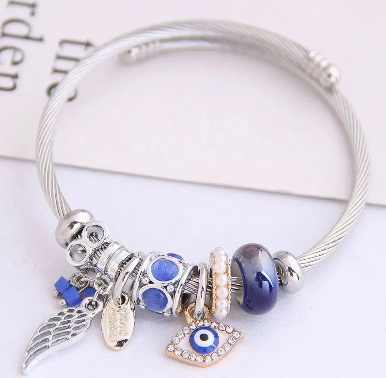 Product image for Stainless Steel Birthstone Pearl Ring/ Luxury Wing Evil Eye Bracelet