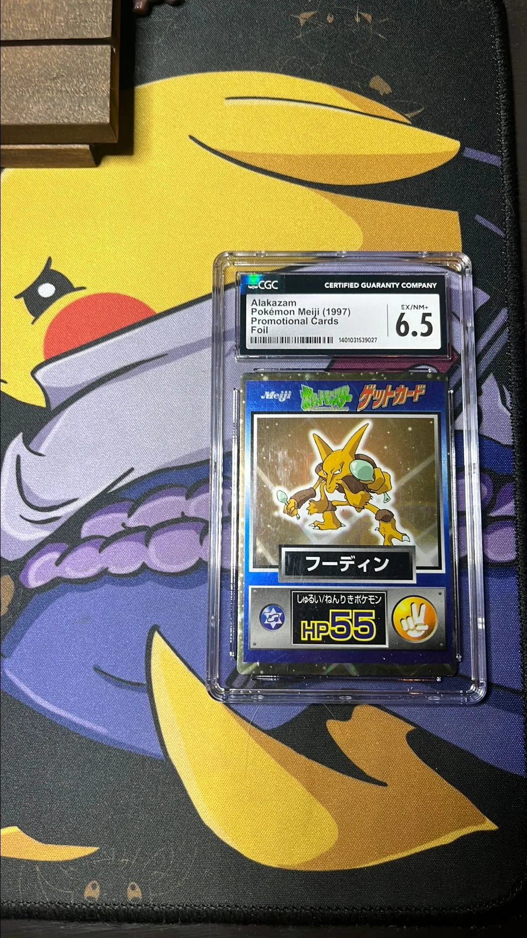 Product image for Alakazam Meiji Promo Foil (1997) / CGC 6.5