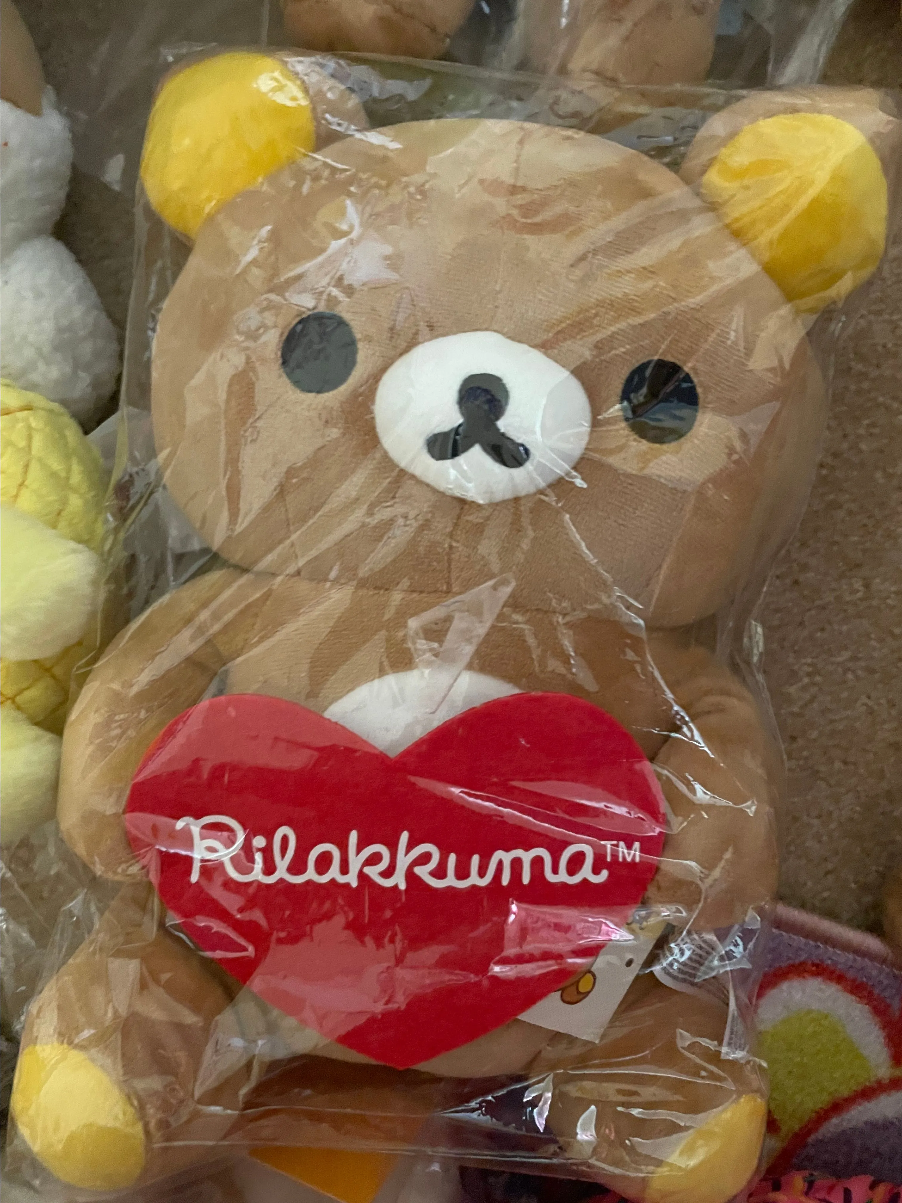 Product image for Rilakuma Holding Heart 12in Plush