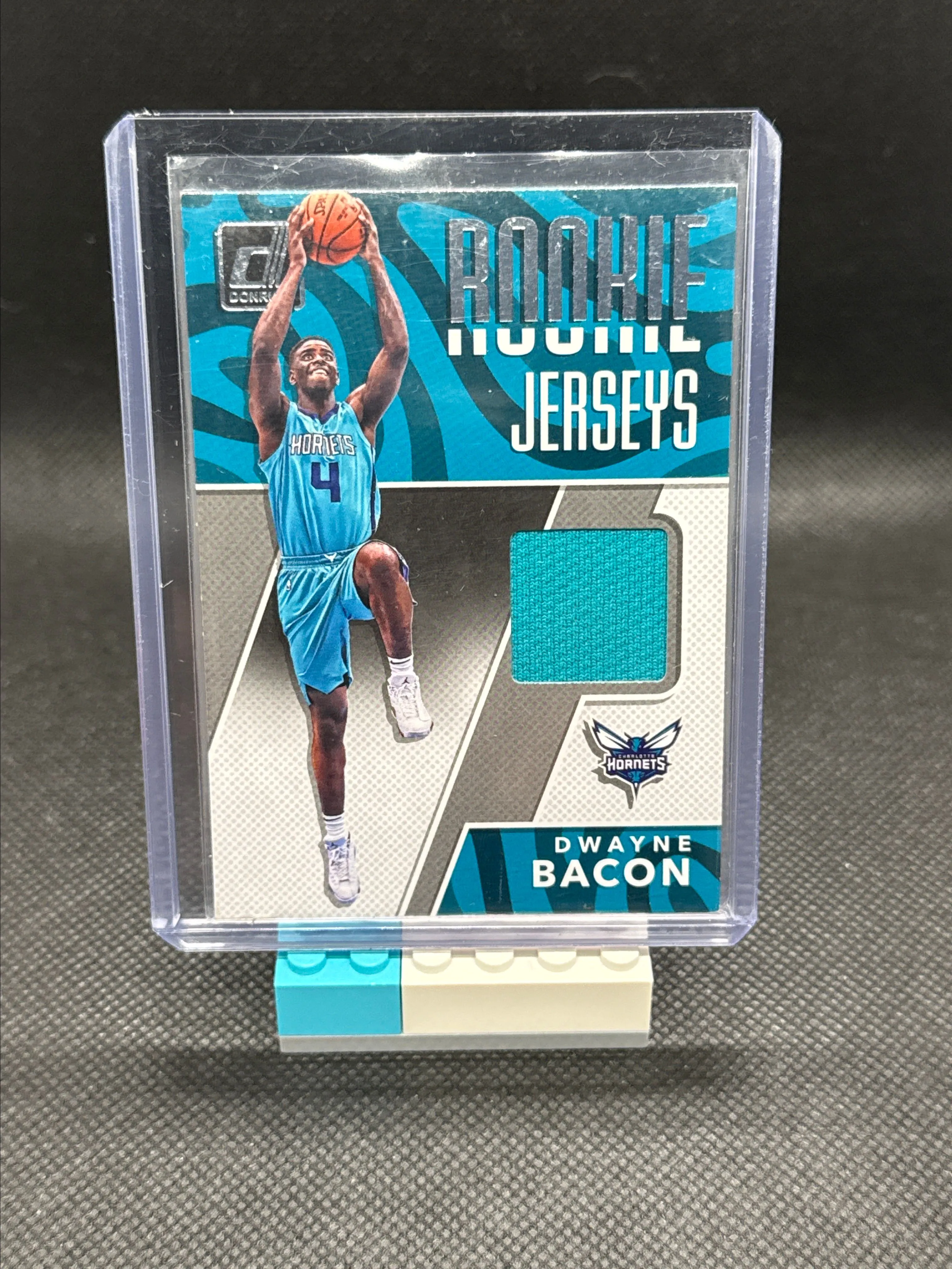 Product image for Dwayne Bacon 2017-18 Donruss #RJ-DB2 Patch Rookie Jerseys Charlotte Hornets