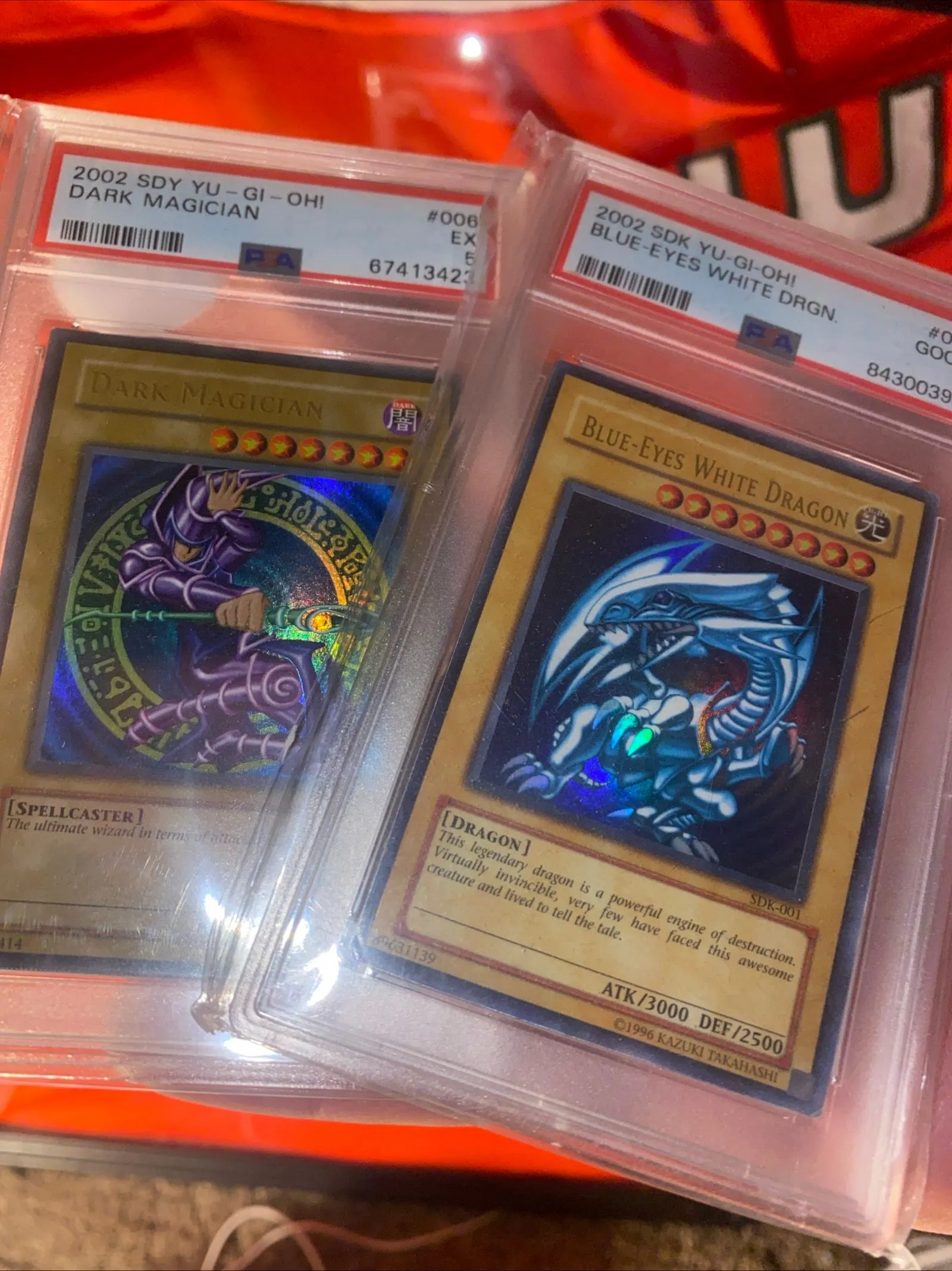 Product image for Two vintage yugioh slabs Psa 5 Dark Magician Psa 2 Blueyes white dragon