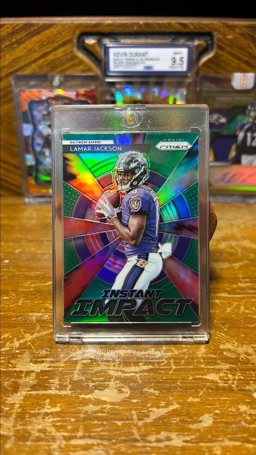 Product image for 2018 Lamar Jackson Green Prizm (Instant Impact) Rookie Insert #11-12