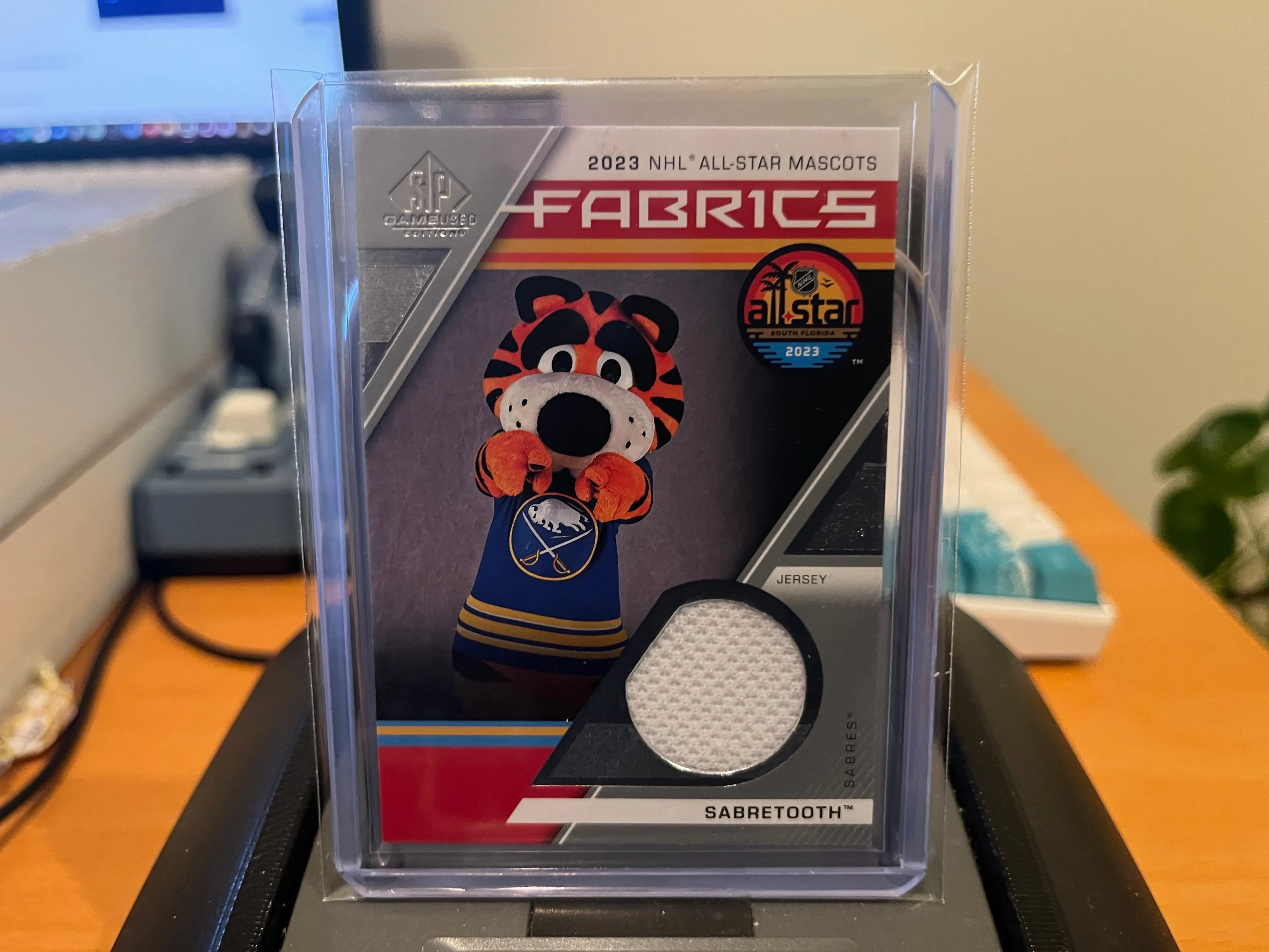 Product image for Sabretooth	Buffalo Sabres	2023 NHL All-Star Mascots Fabrics 1CLR Jersey Patch - Event Used 1:6 Packs Sabres