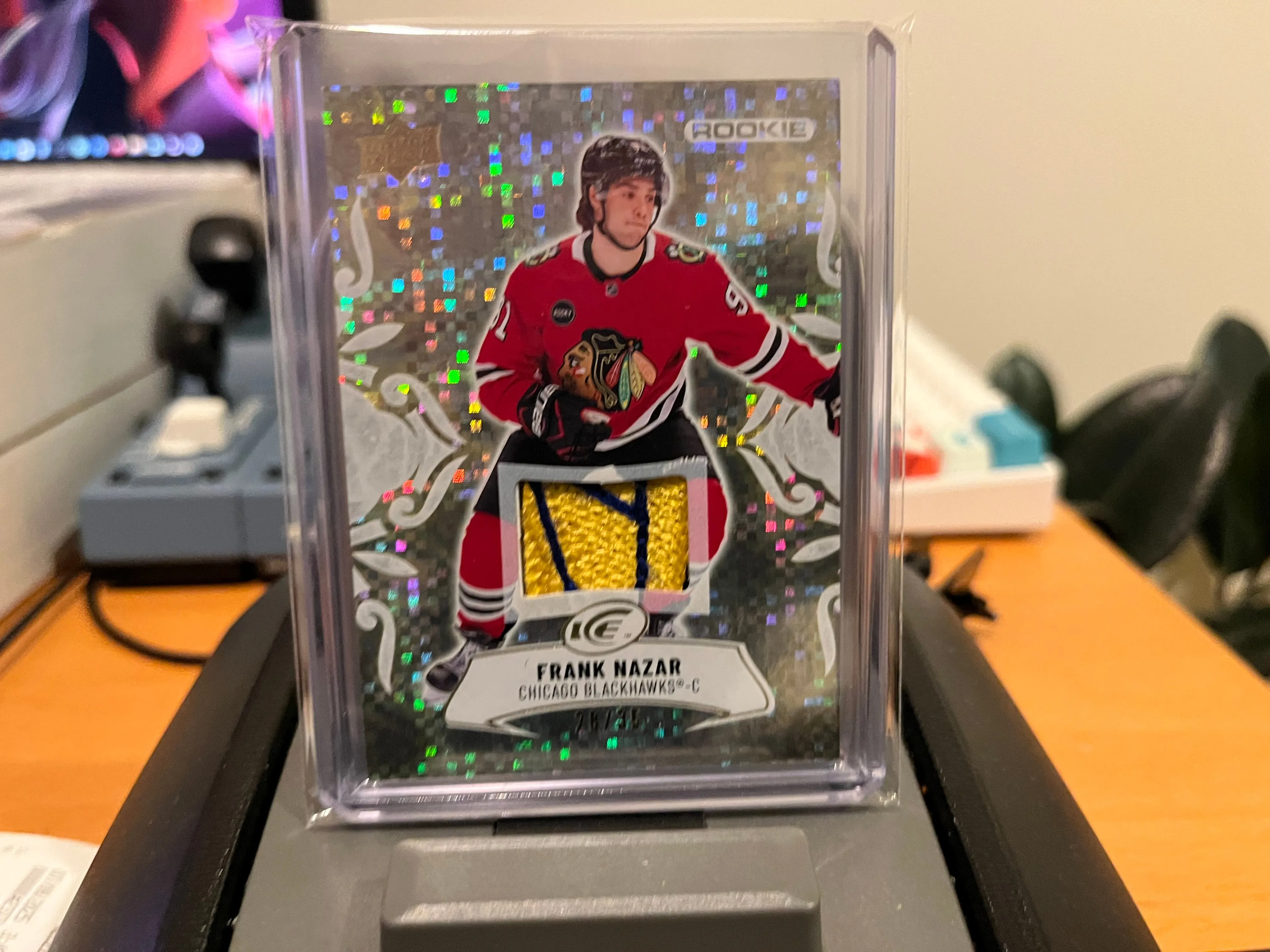 Product image for Nazar	Frank	Gold Patch Rookie 3CLR Jersey Patch 28/35 - Serial Numbered Player Worn RC Blackhawks Hawks
