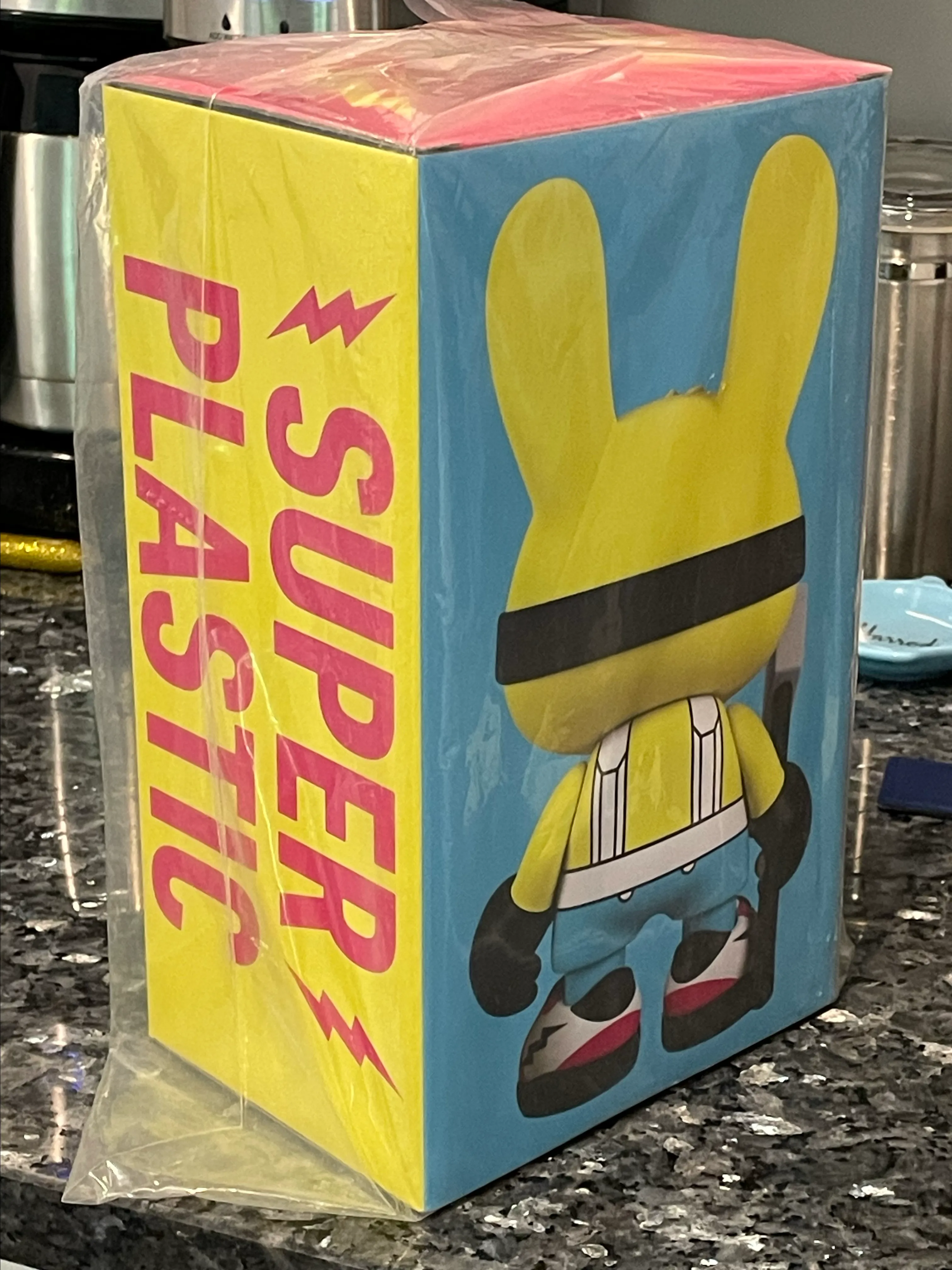 Product image for Superplastic: Guggimon Yellow w/ Pink