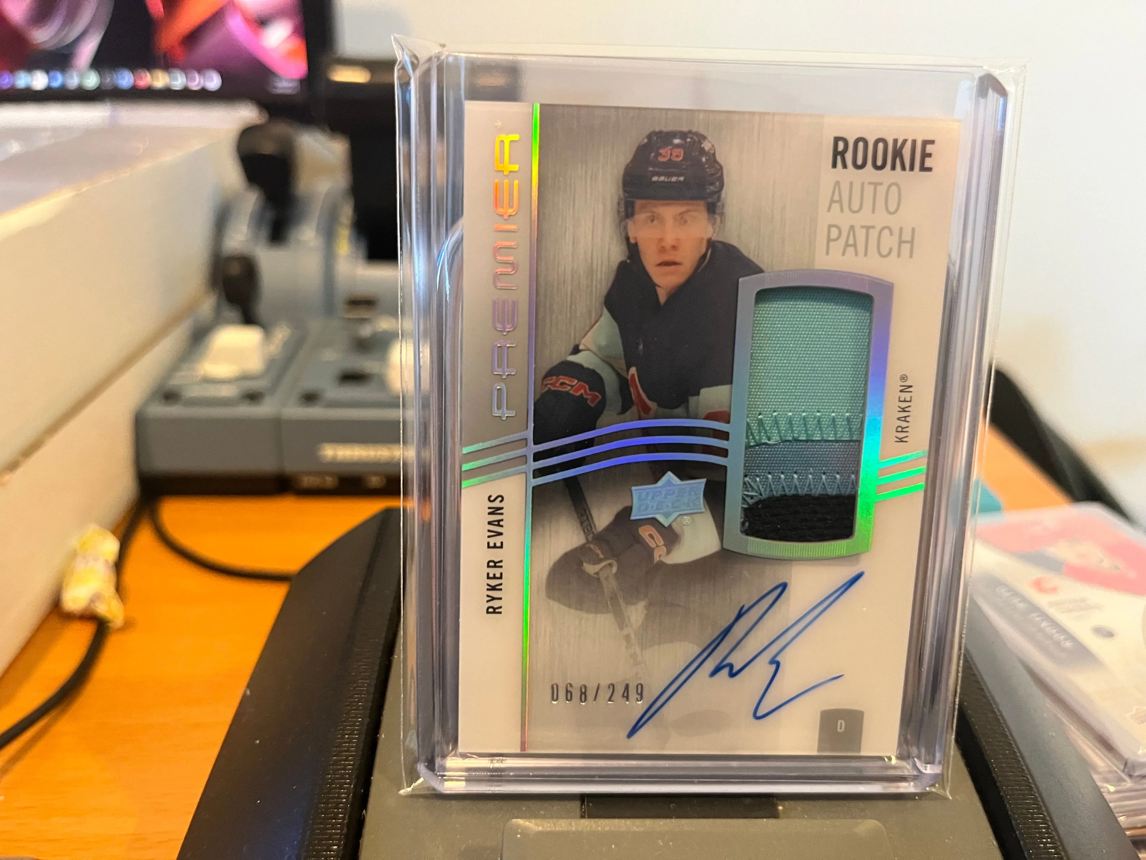 Product image for Evans	Ryker	Acetate Rookie Auto 3CLR Jersey Patch 68/249 - Serial Numbered Player Worn RPA RC Kraken