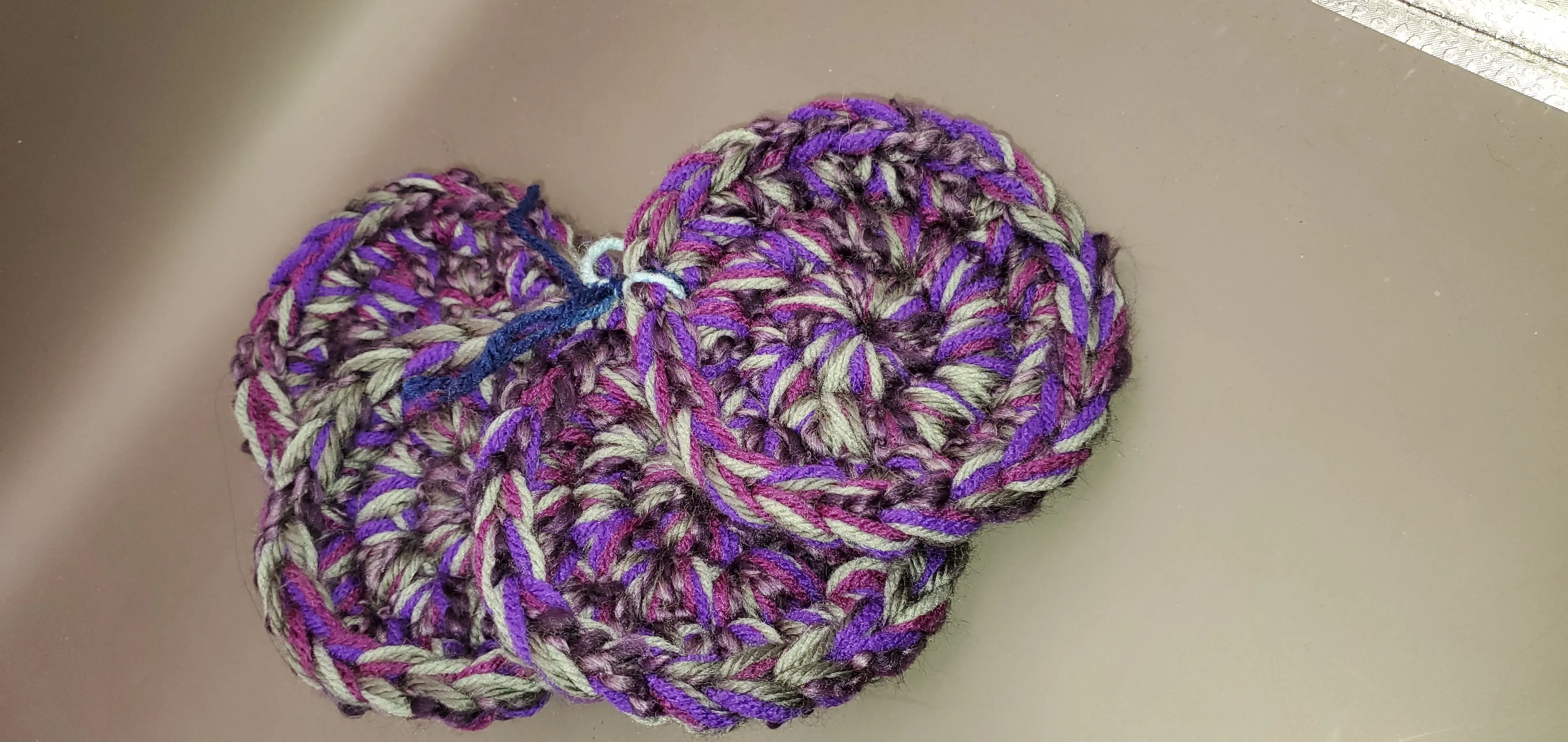 Product image for Purple toned crochet coasters