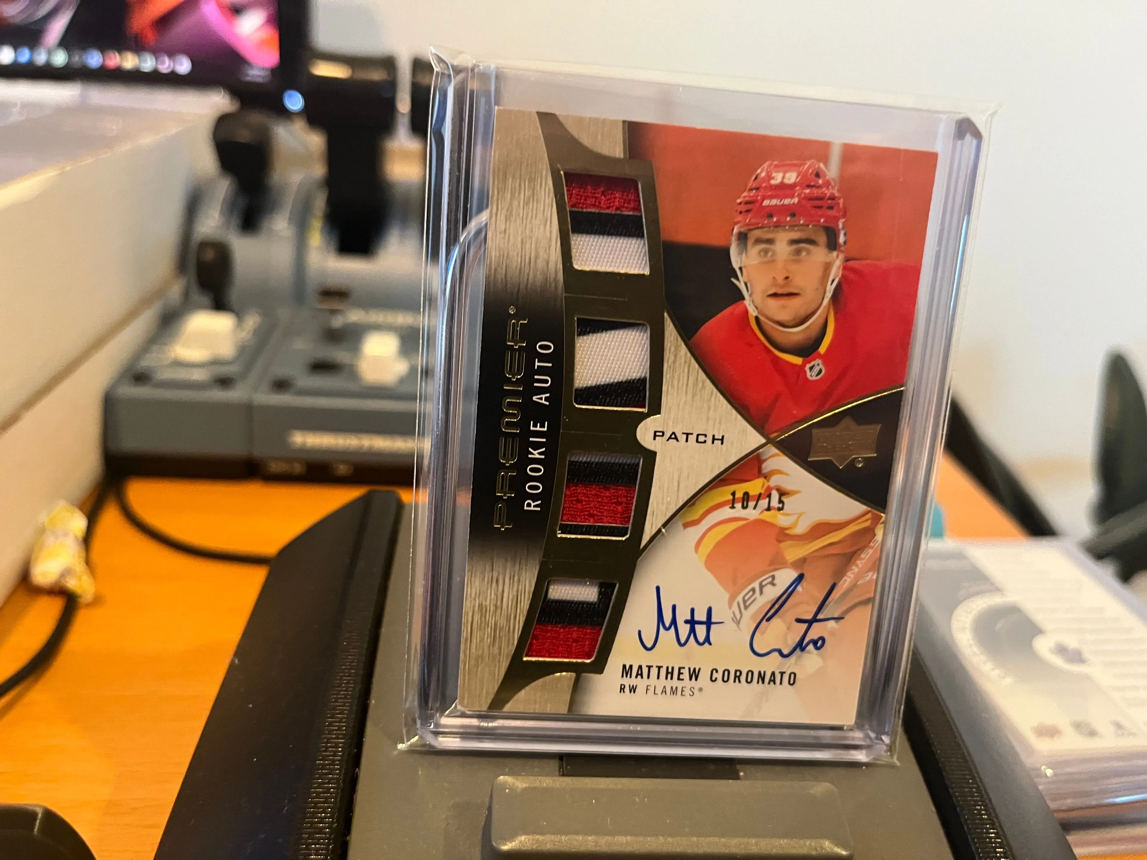 Product image for Coronato	Matthew	FLL 2023 Premier Rookie Auto Patch 3CLR Jersey 10/15 - Serial Numbered Player Worn RPA RC Flames