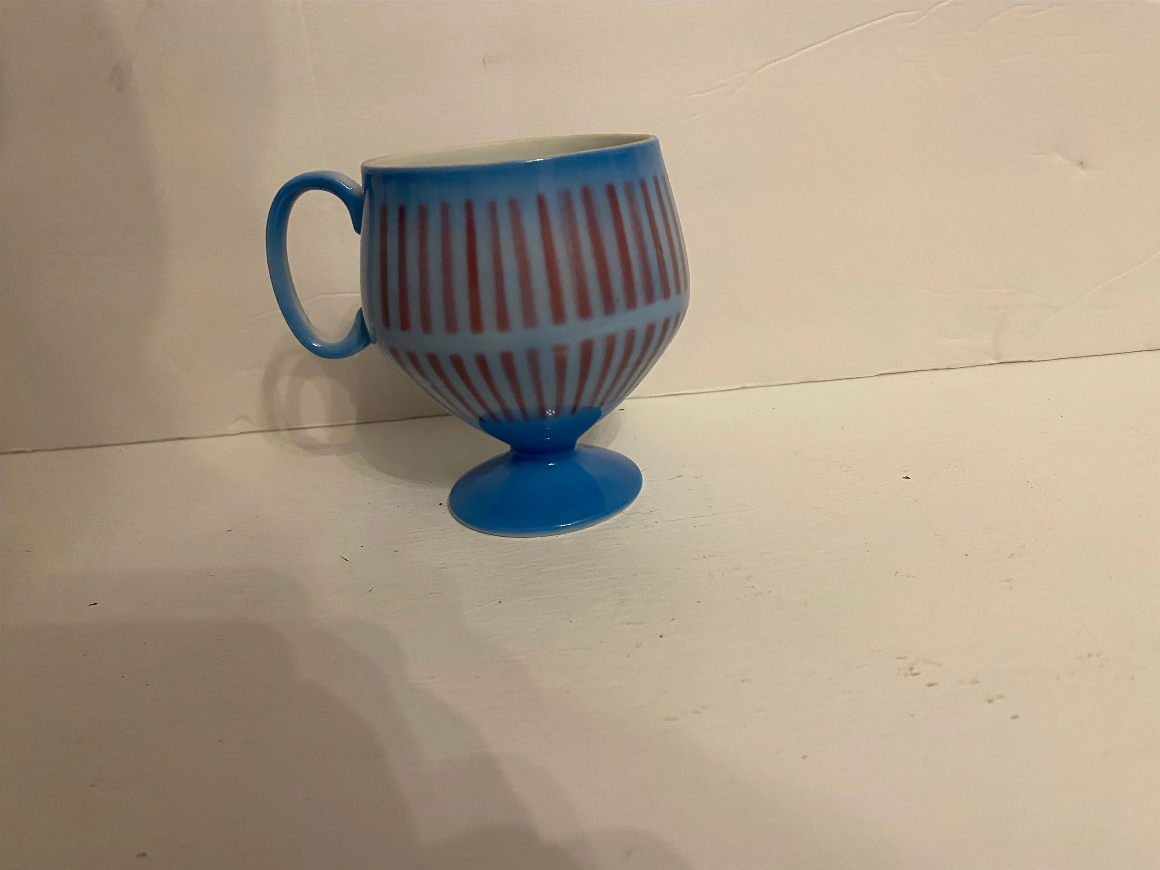 Product image for Blue/red pedestal cup made in Japan