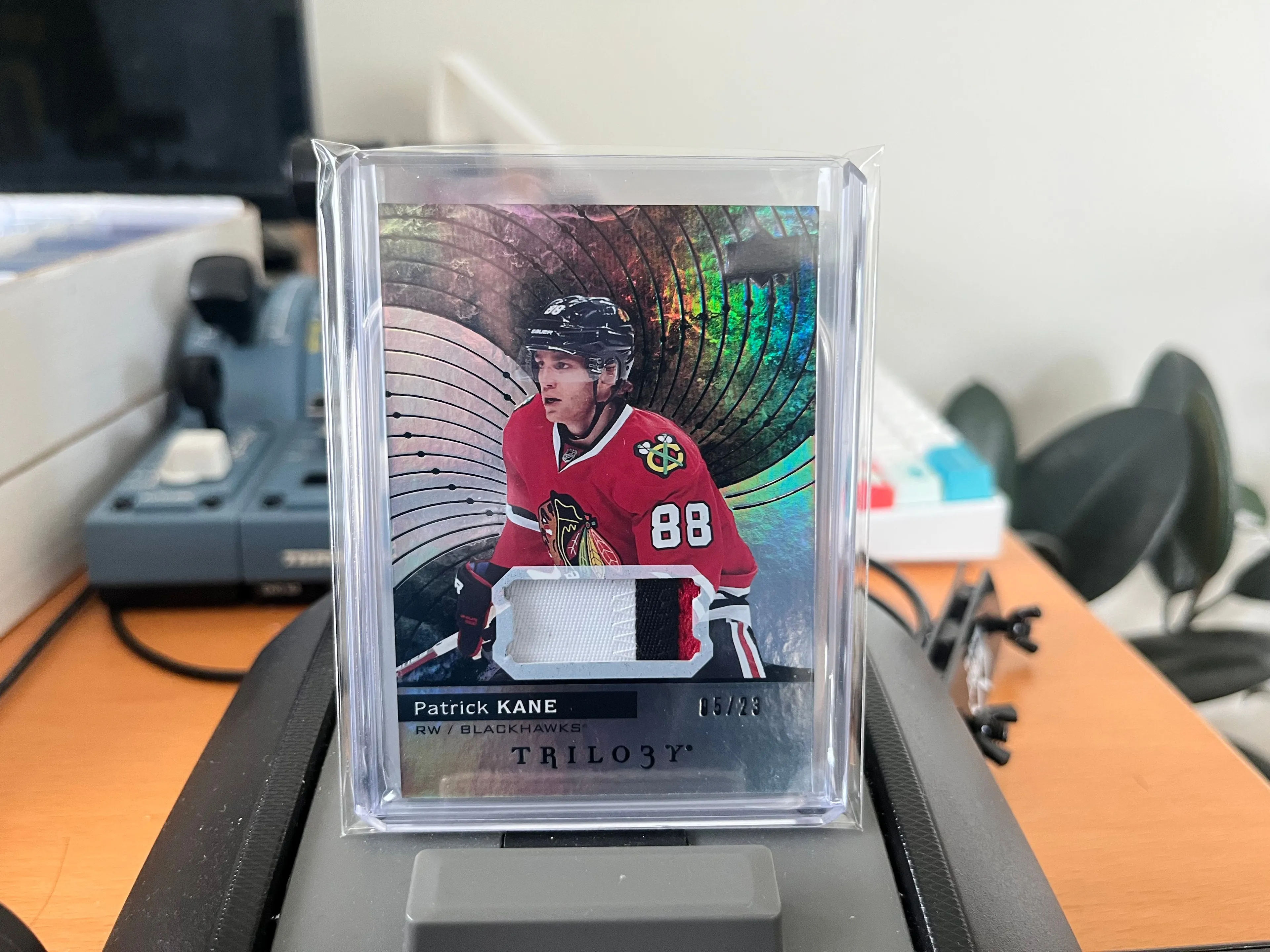 Product image for Kane	Patrick	Relics Prime Materials Black Foil 3CLR Jersey Patch 05/23 - Serial Numbered Game Used  Blackhawks Hawks Red Wings