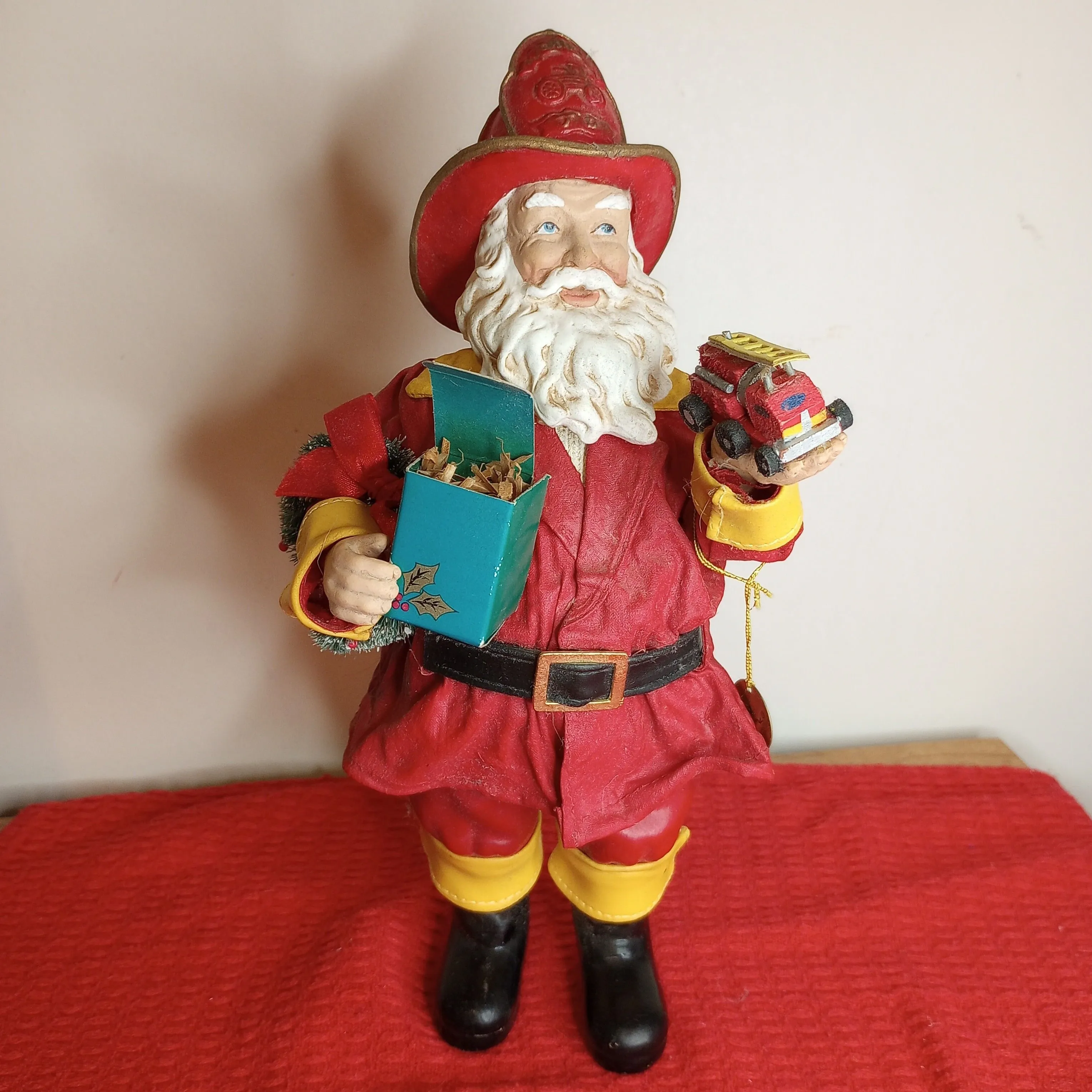Product image for  Clothtique Santa Three Alarm Fireman opening present figure