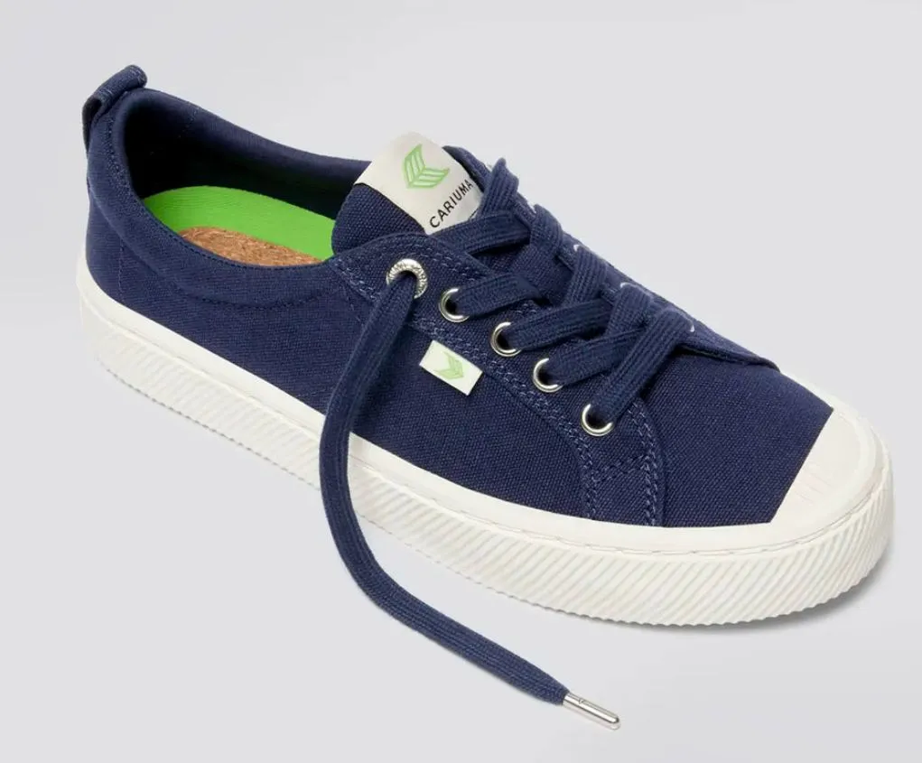 Product image for (W10.5, M9) NWOB CARIUMA OFF BLUE CANVAS SNEAKER UNISEX
