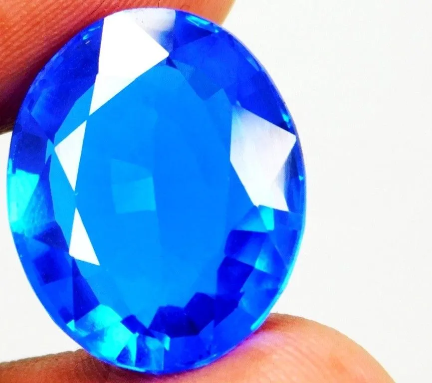 Product image for 12.00 Ct (Est.) Natural Tanzanite-Like Zoisite Blue Excellent Oval Cut Gemstone. All measurements ar