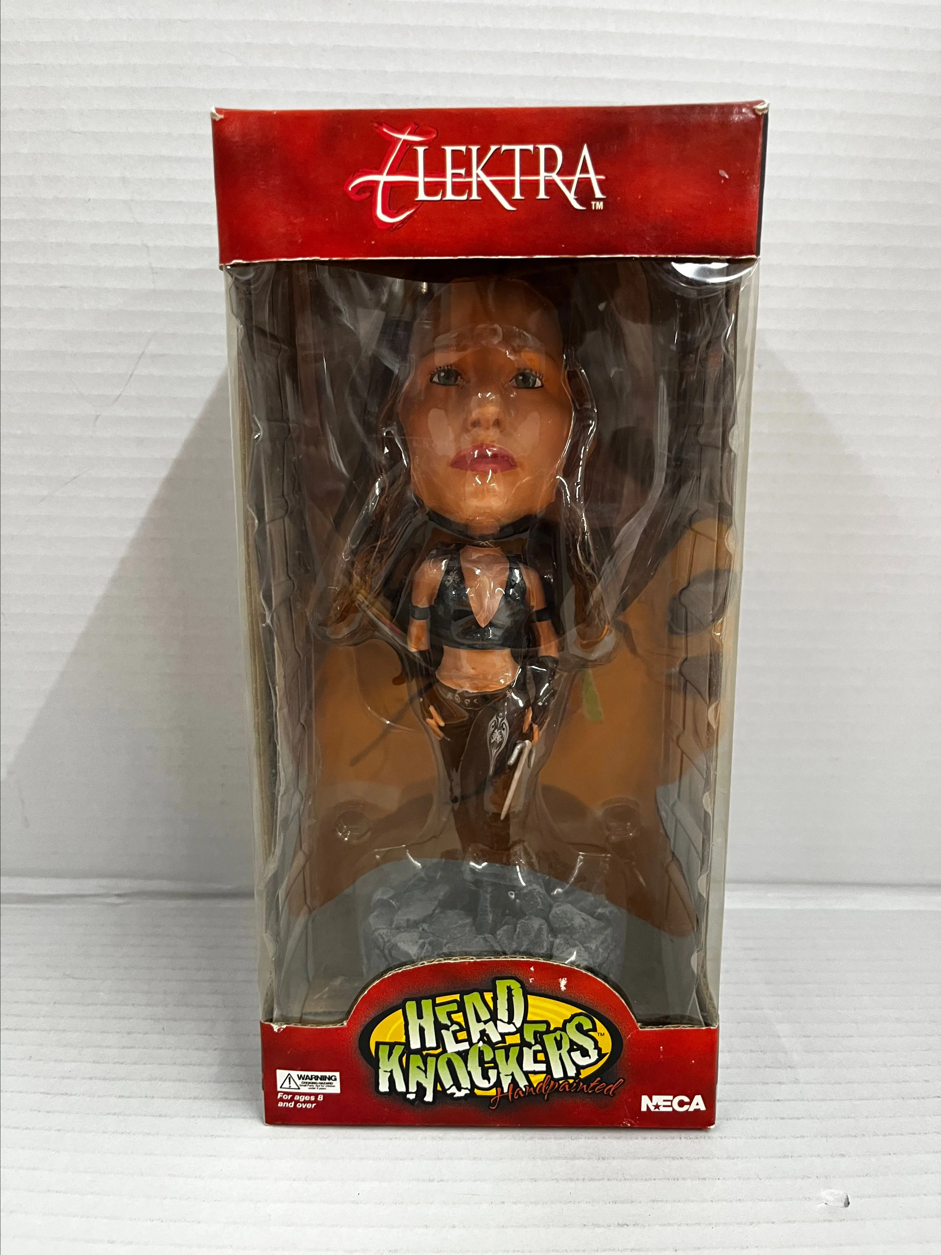 Product image for ELEKTRA Jennifer Garner MARVEL-NECA 8 INCH HEAD KNOCKERS
