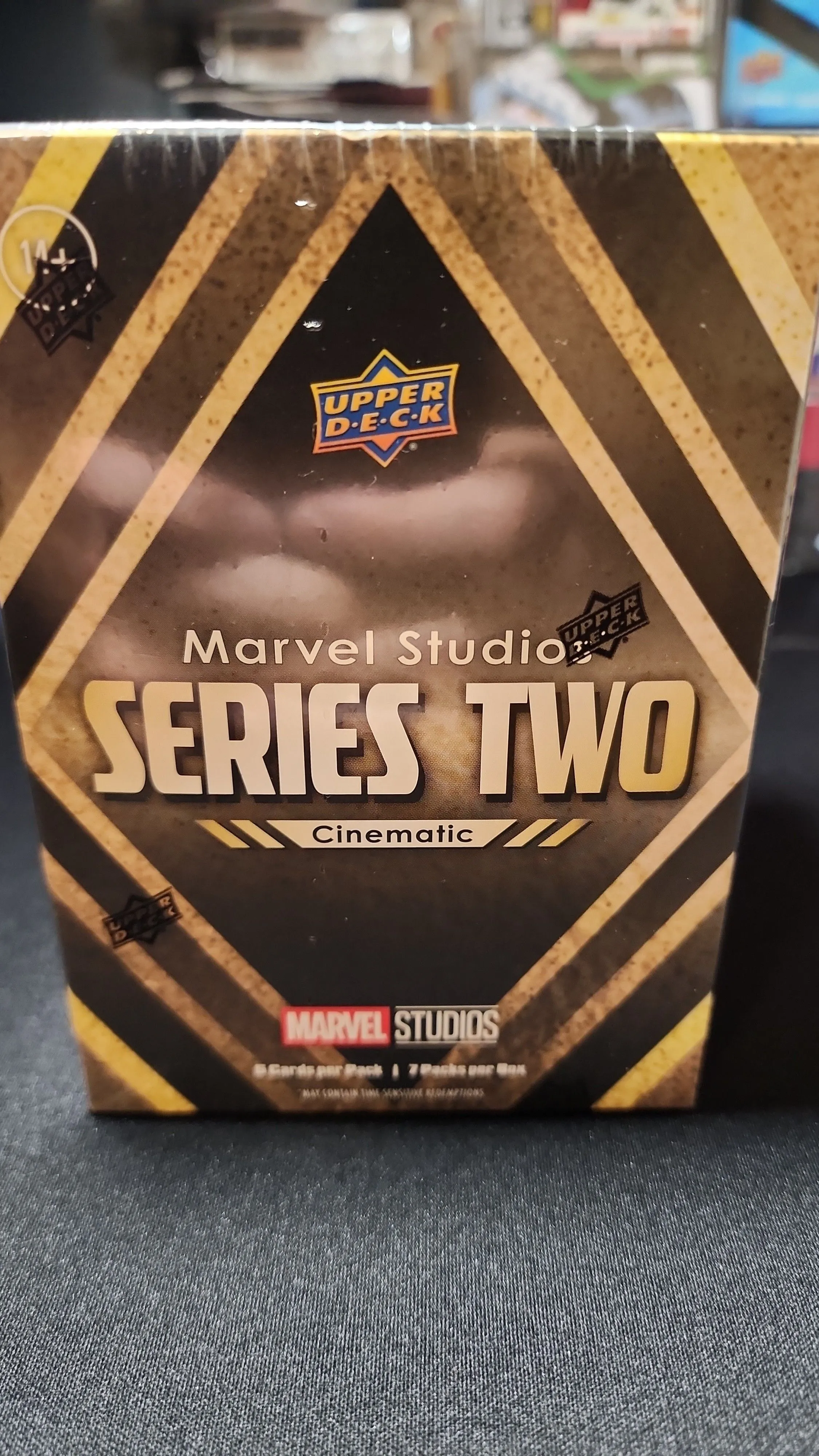 Product image for random coin and Marvel Studios series two cinematic blaster