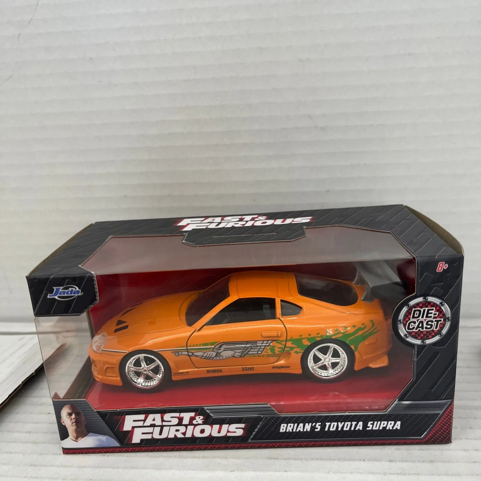 Product image for Jada Toys - Fast and Furious Brian's Car Toyota Supra 1995, Scale 1:32 - Orange