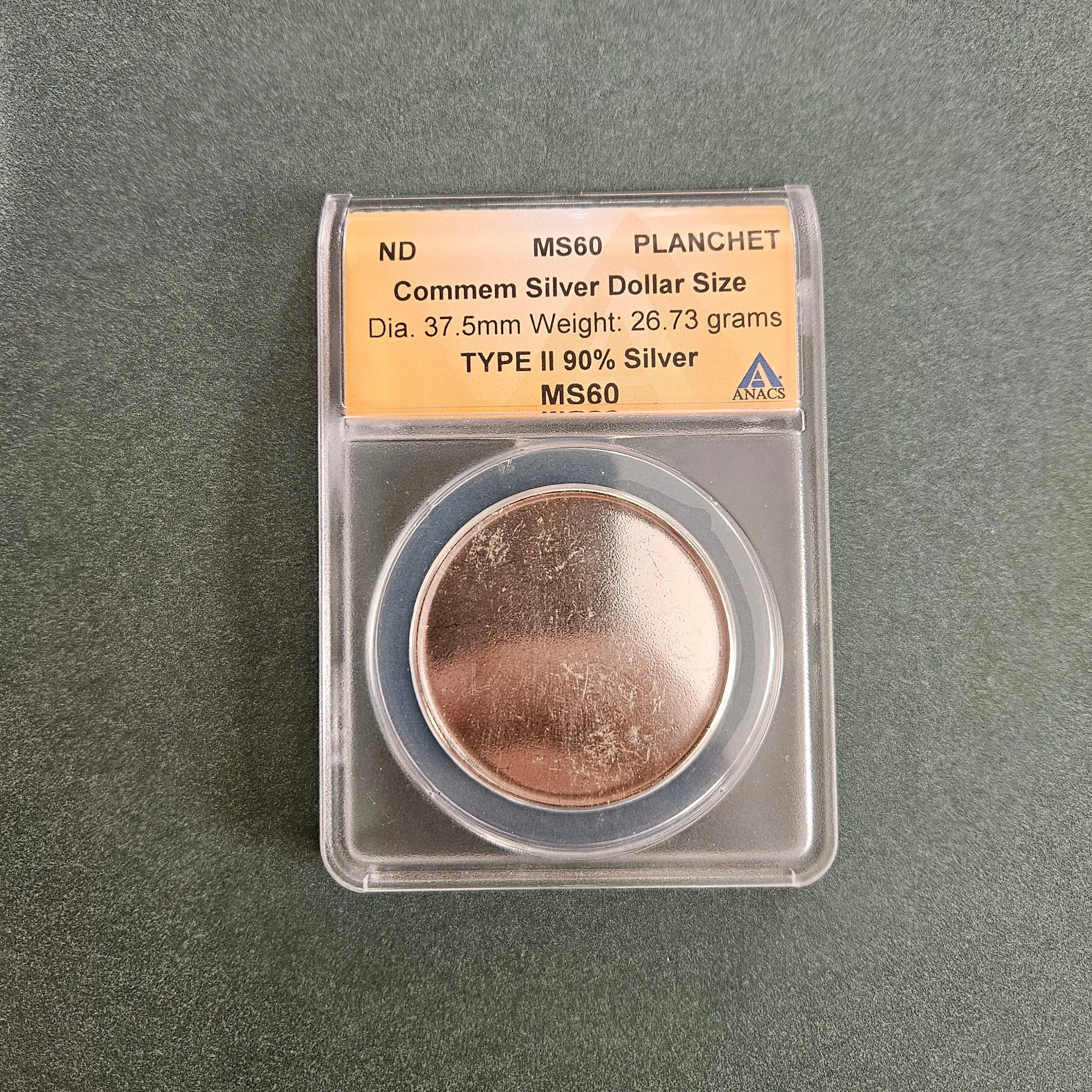 Product image for MS60 PLANCHET COMMEM SILVER DOLLAR SIZE