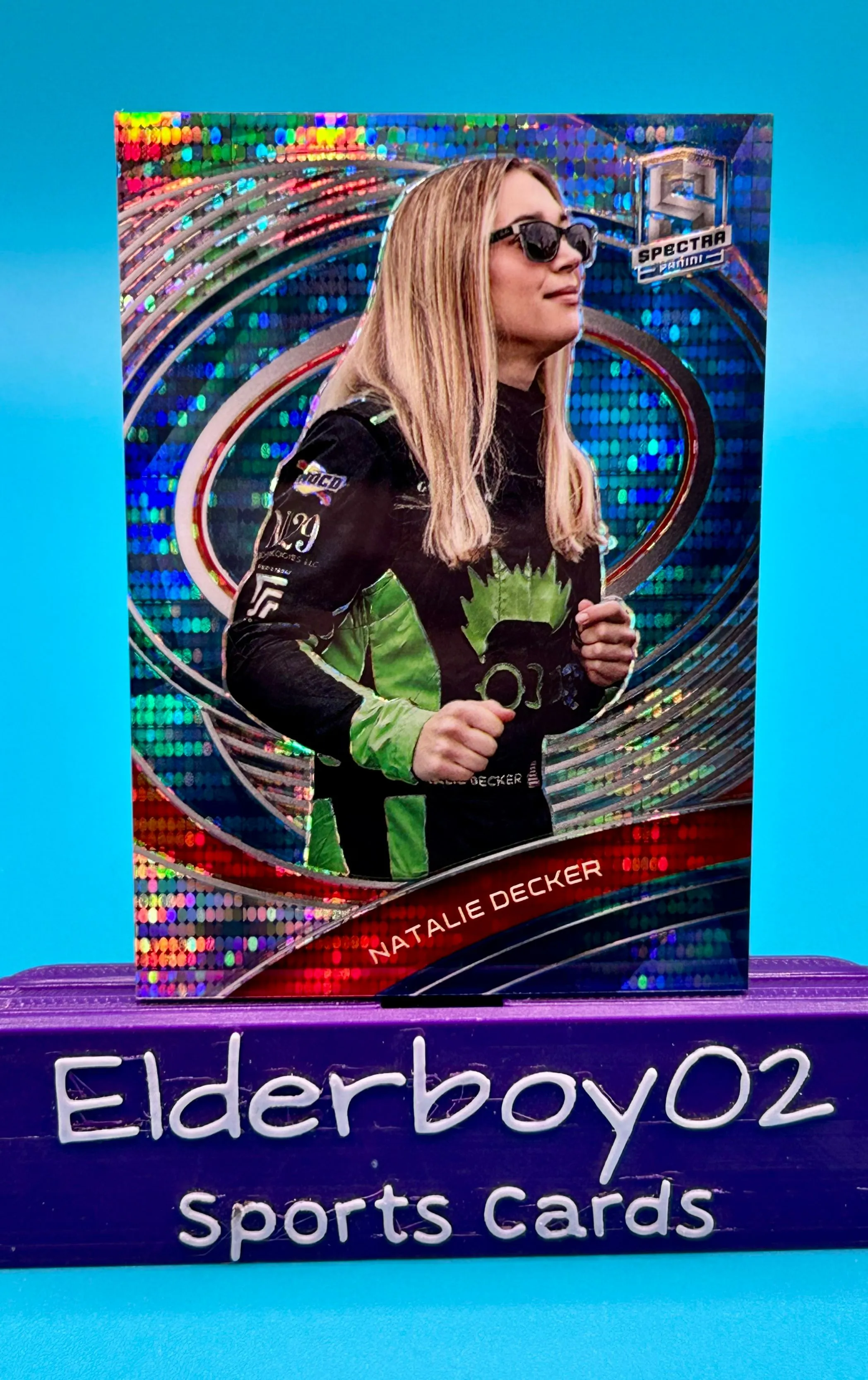 Product image for Natalie Decker 66/99 Spectra Celestial Blue Prizm 2022 Panini Chronicles Racing Nascar