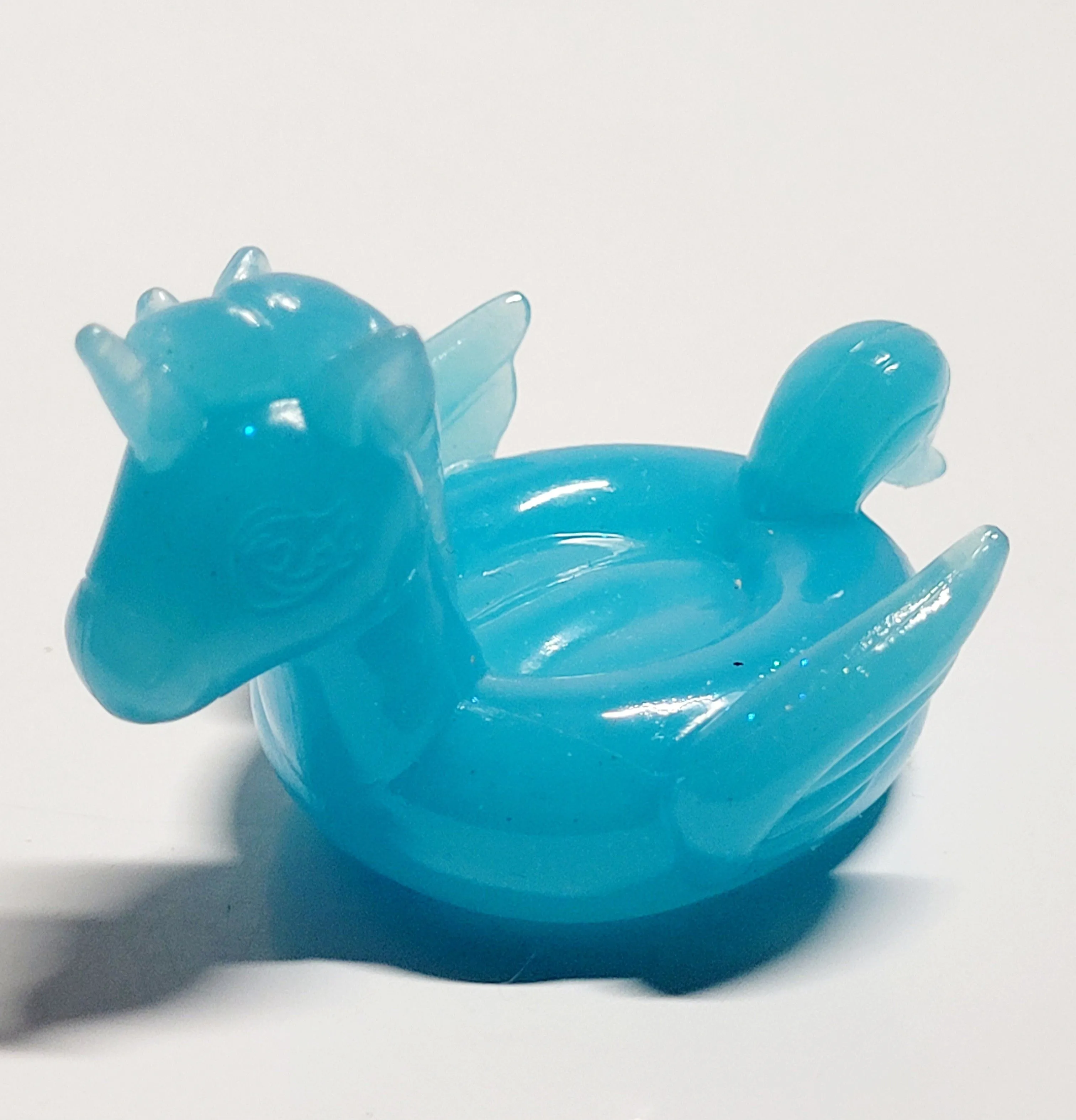 Product image for Hatchimals CollEGGtibles Unicorn Family Translucent Unicorn Pool Float Accessory. The object in the 