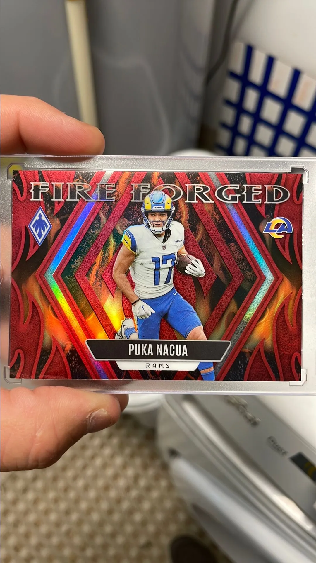 Product image for 2023 Panini Phoenix Puka Nucua Fire Forged Red #ed 130/199 (RC)