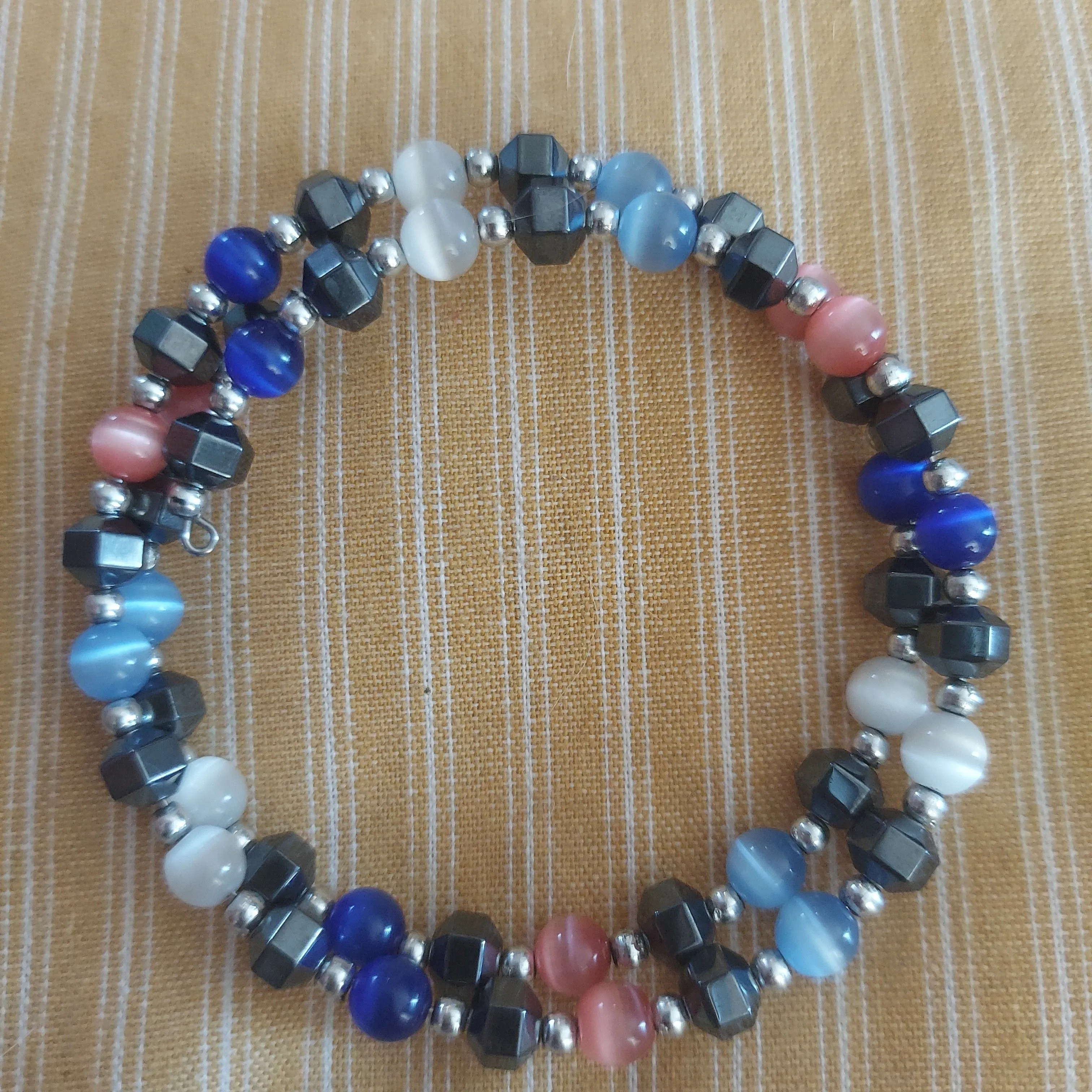 Product image for spiral bead bracelet catseye and hematite