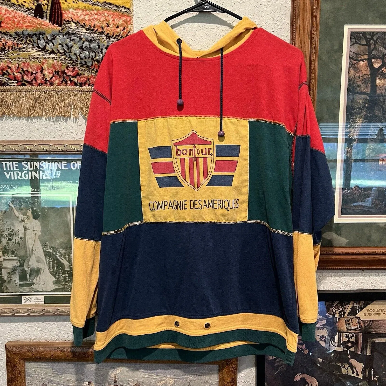 Product image for Vintage 90’s Multicolor Bonjour Des Ameriques Hooded Long Sleeve Shirt Size Lrg
