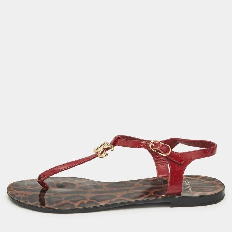 Product image for Dolce and Gabbana Red Patent Leather Jelly Bow Thong Flat Sandals